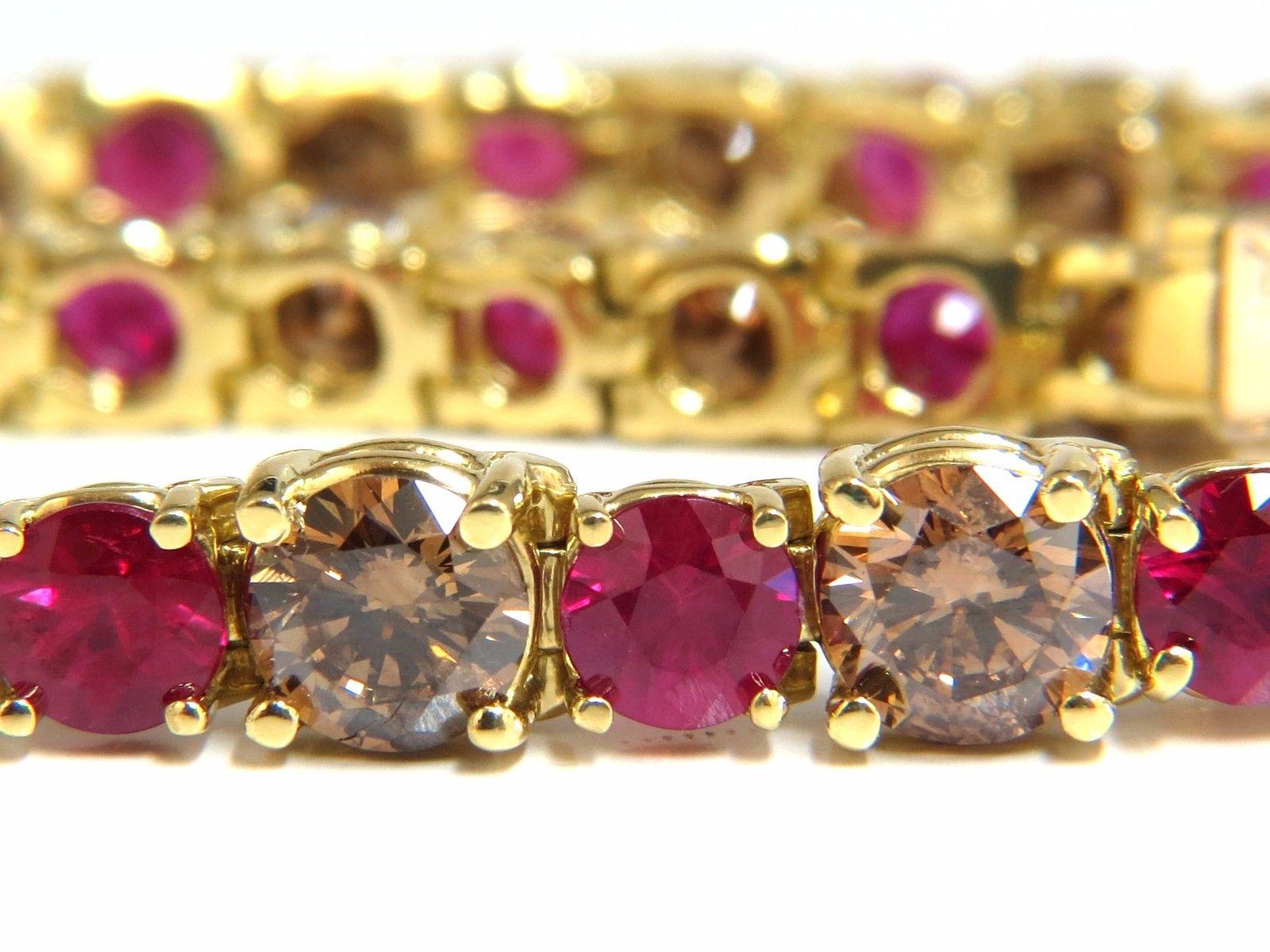 10.43ct. Natural Ruby bracelet.

Round cuts, Fully Faceted.

Vibrant Red, excellent Sparkle.

Clean Clarity & Transparent.

Graduating Diameters: 5.5 -4.8 mm 



13.71ct. natural fancy color brown diamonds:

Rounds, Full Cut

Vs-2