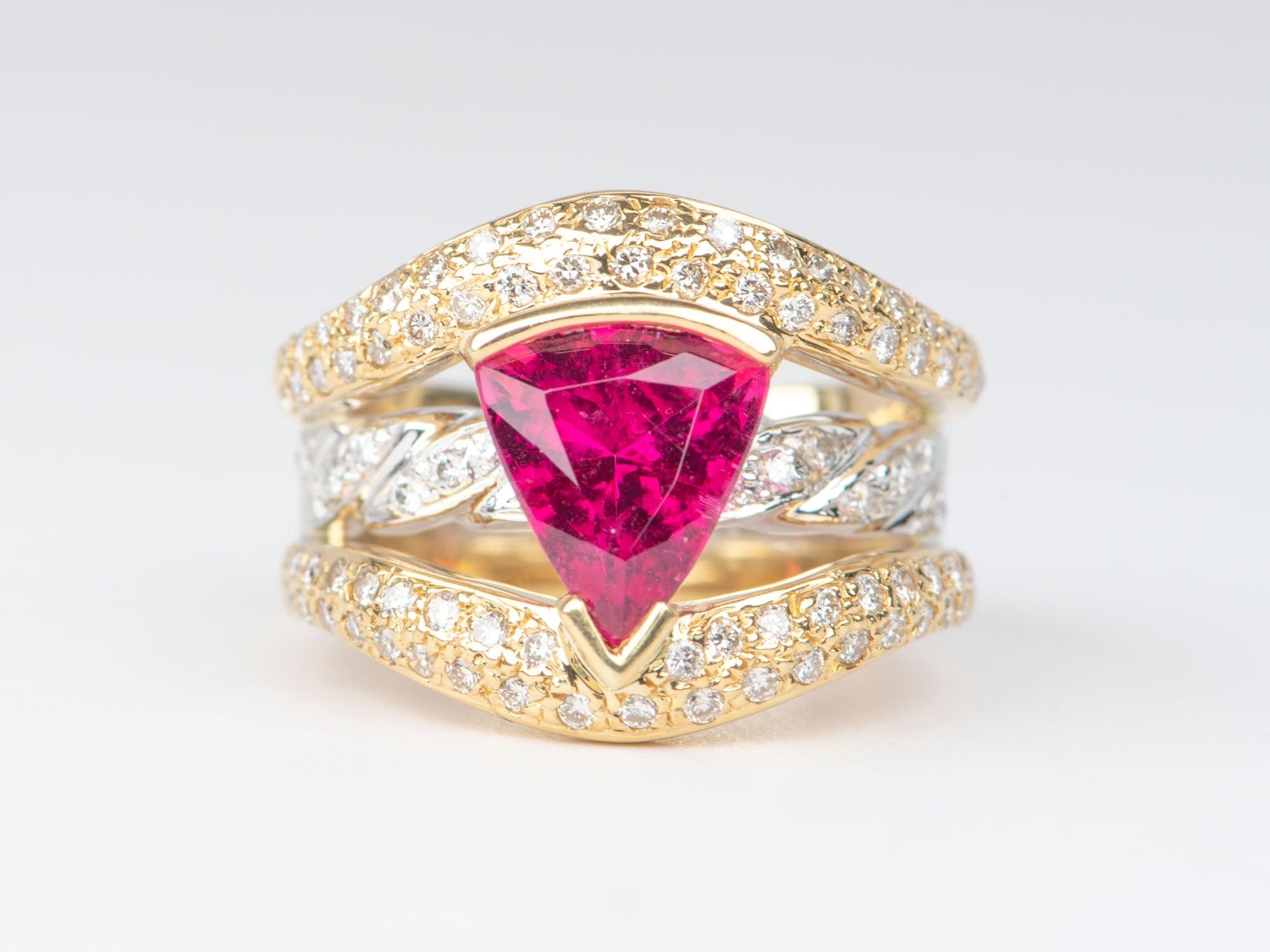 ♥ This is a stunning dual-tone ring featuring a bright red rubellite tourmaline in the center and diamond pave on all 3 ring bands.
♥ The split-shank is made in solid 18K gold, while the middle row is made in platinum, offering more interest to this