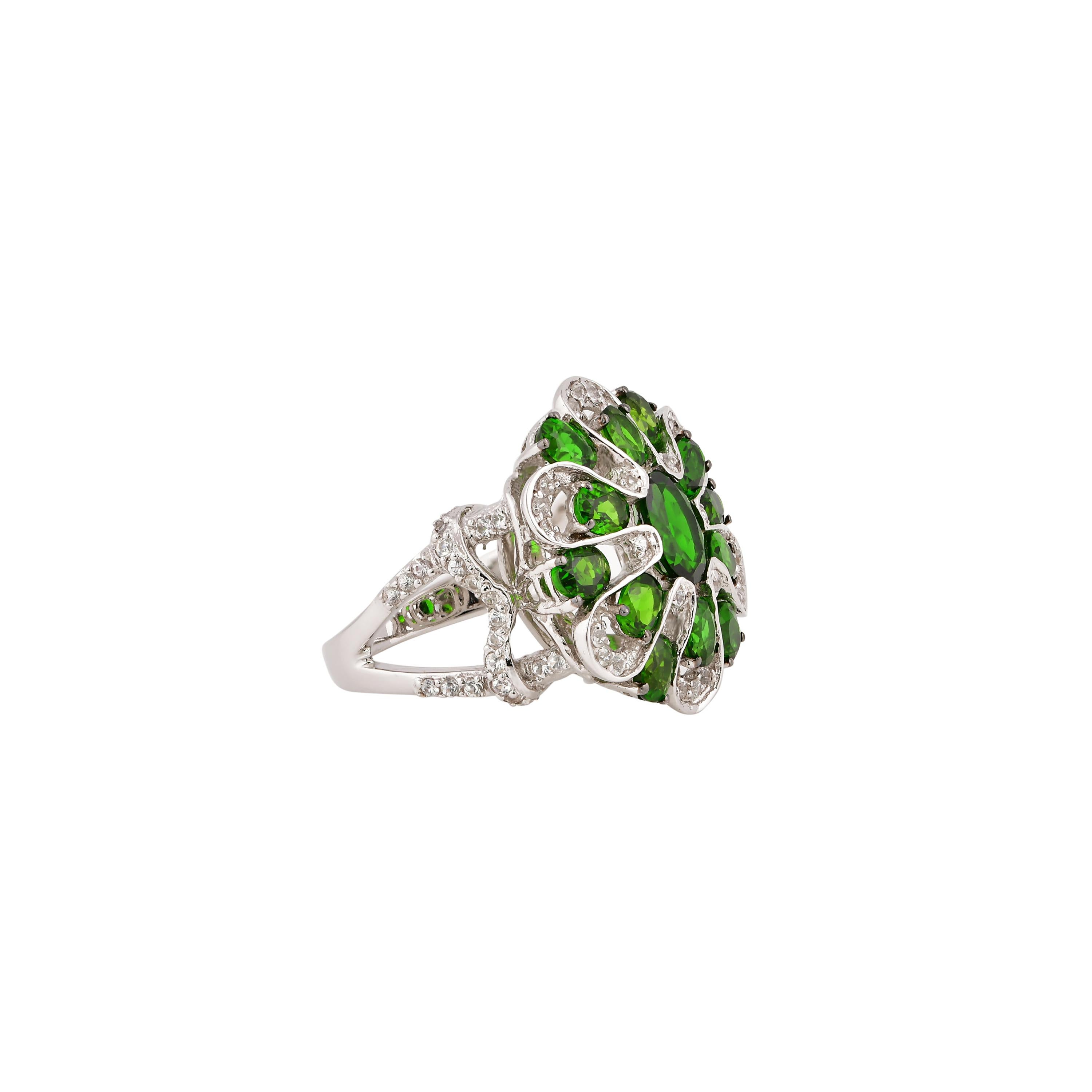 Unique and Designer Cocktail Rings by Sunita Nahata Fine Design.

Classic Chrome Diopside ring in 14K White gold with White Sapphire. 

Chrome Diopside: 0.720 carat, 5X7mm size, oval shape.
Chrome Diopside: 1.70 carat, 4X3mm size, oval shape. 
White