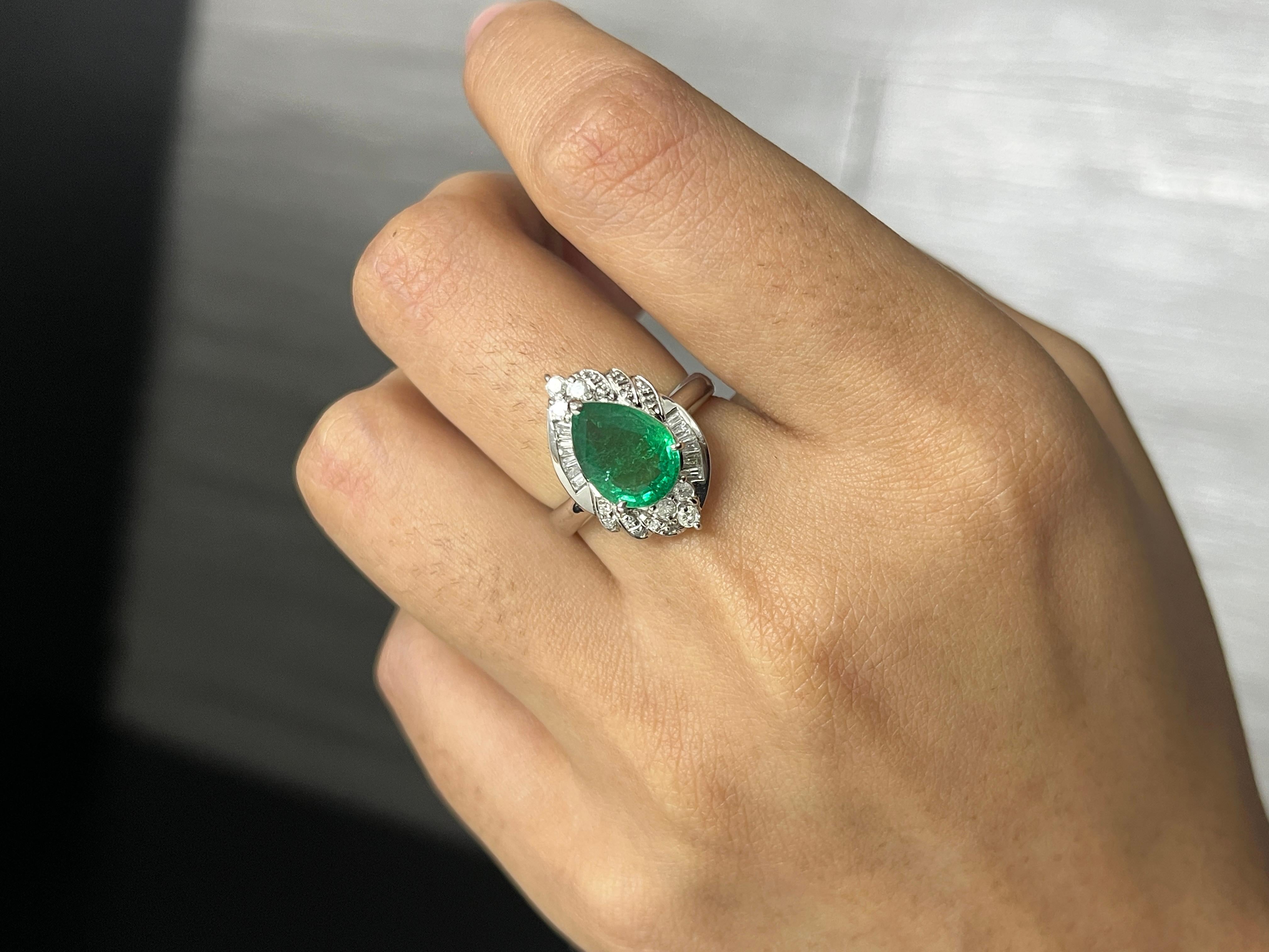 Introducing the epitome of luxury and sophistication, behold the breathtaking Art Deco inspired, Emerald Statement Ring, a true marvel in the world of fine jewelry. Crafted with precision and passion, this extravagant piece exudes opulence from