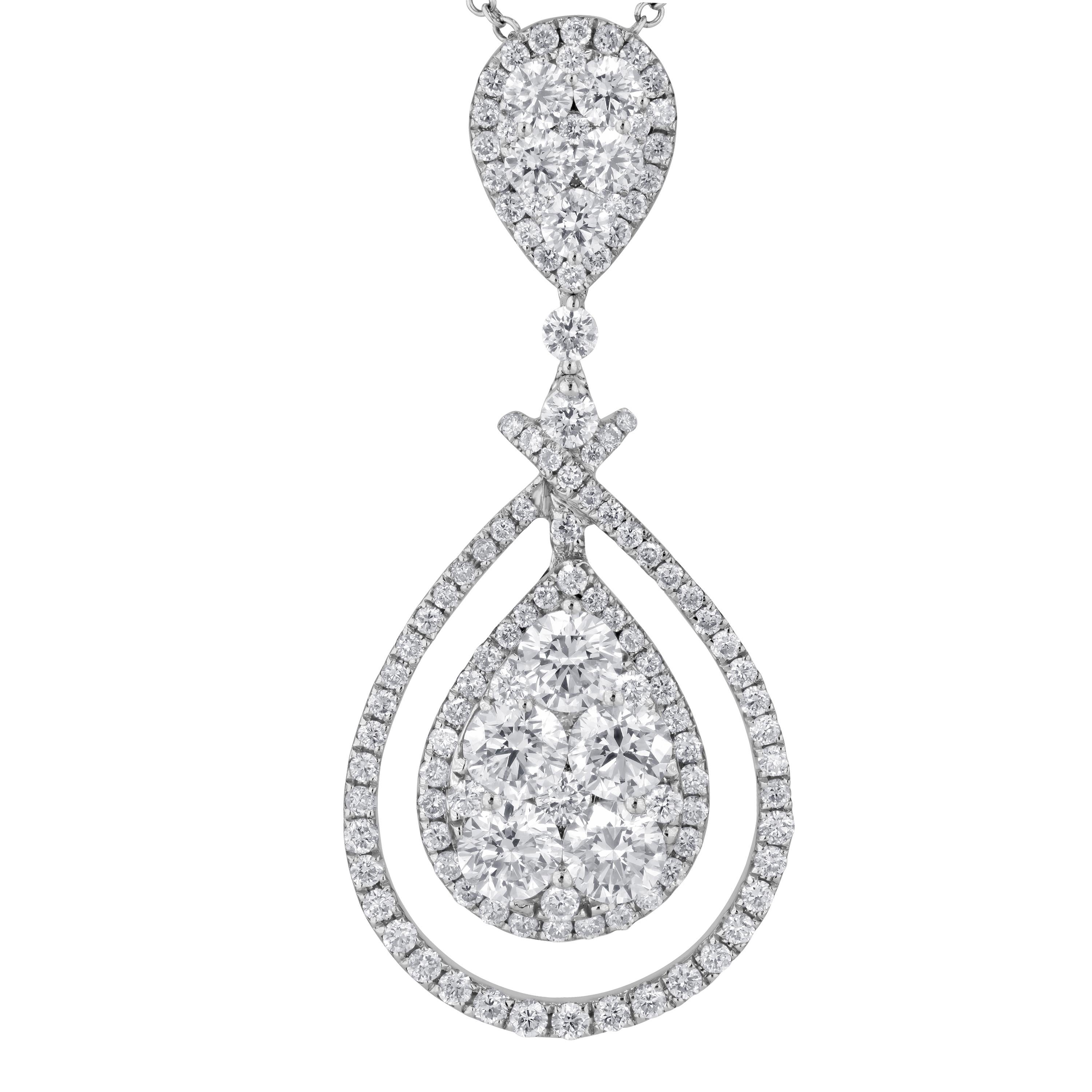 Prepare to be captivated by the delicate allure of this pendant, a true testament to meticulous craftsmanship and artistic design. At first glance, it may appear to be a substantial pear-shaped pendant, but upon closer inspection, the magic unfolds.