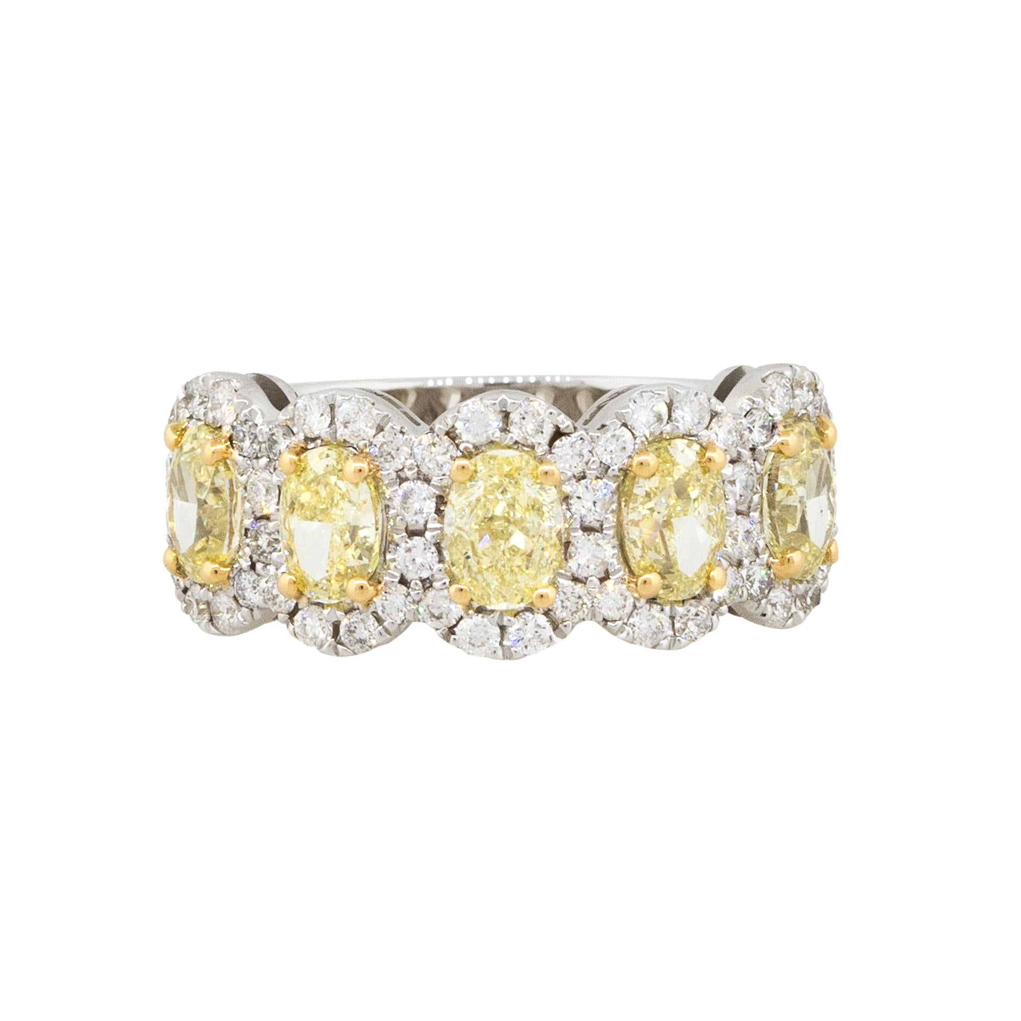18k White Gold 2.42ctw Five Oval Fancy Yellow Diamond Halo Ring

Style: Women's 5 Diamond Halo Wedding Band
Material: 18k White Gold
Diamond details: Approx. 1.85ctw of Oval cut Diamonds. Diamonds are Fancy Yellow in color and VS in clarity. There