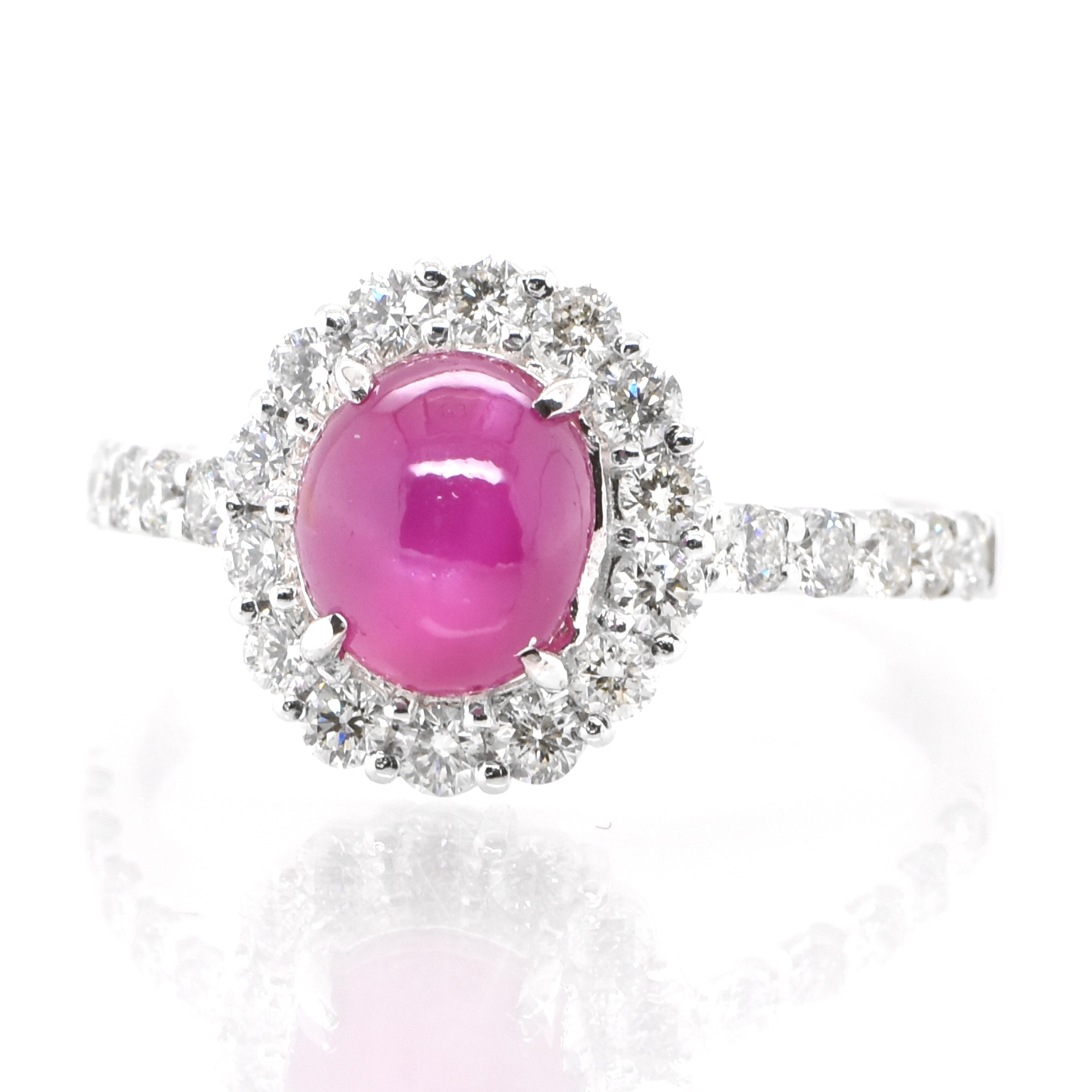 A beautiful ring set in Platinum featuring a 2.42 Carat Natural Star Ruby and 0.60 Carat Diamonds. Rubies are referred to as 