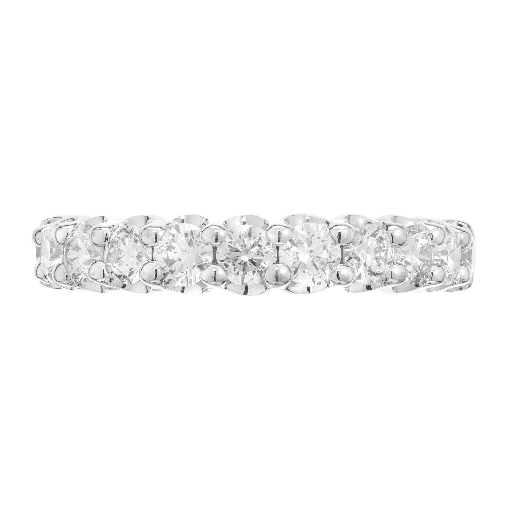 Diamond wedding band ring. Simple common prong style half way around wedding band set with bright 11 round brilliant cut white diamonds totaling 2.42cts. The ring is a size 8.5 and can be sized up or down one size. 

11 round brilliant cut diamonds,