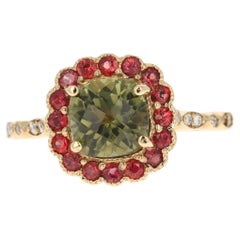 Anello in oro giallo con tormalina, zaffiro e diamante da 2.42 carati