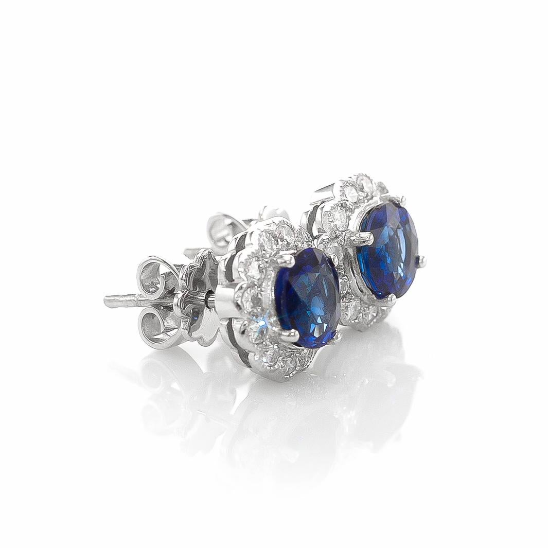 Mixed Cut Natural Blue Sapphires 2.42 Carats set in 18K White Gold Earrings with Diamonds For Sale