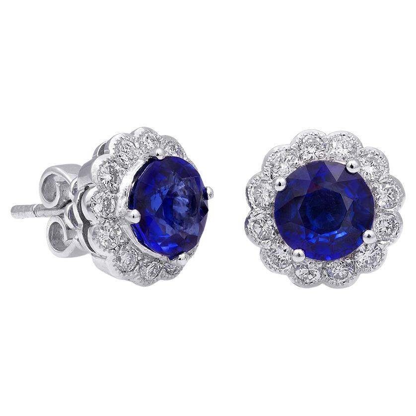 Natural Blue Sapphires 2.42 Carats set in 18K White Gold Earrings with Diamonds For Sale