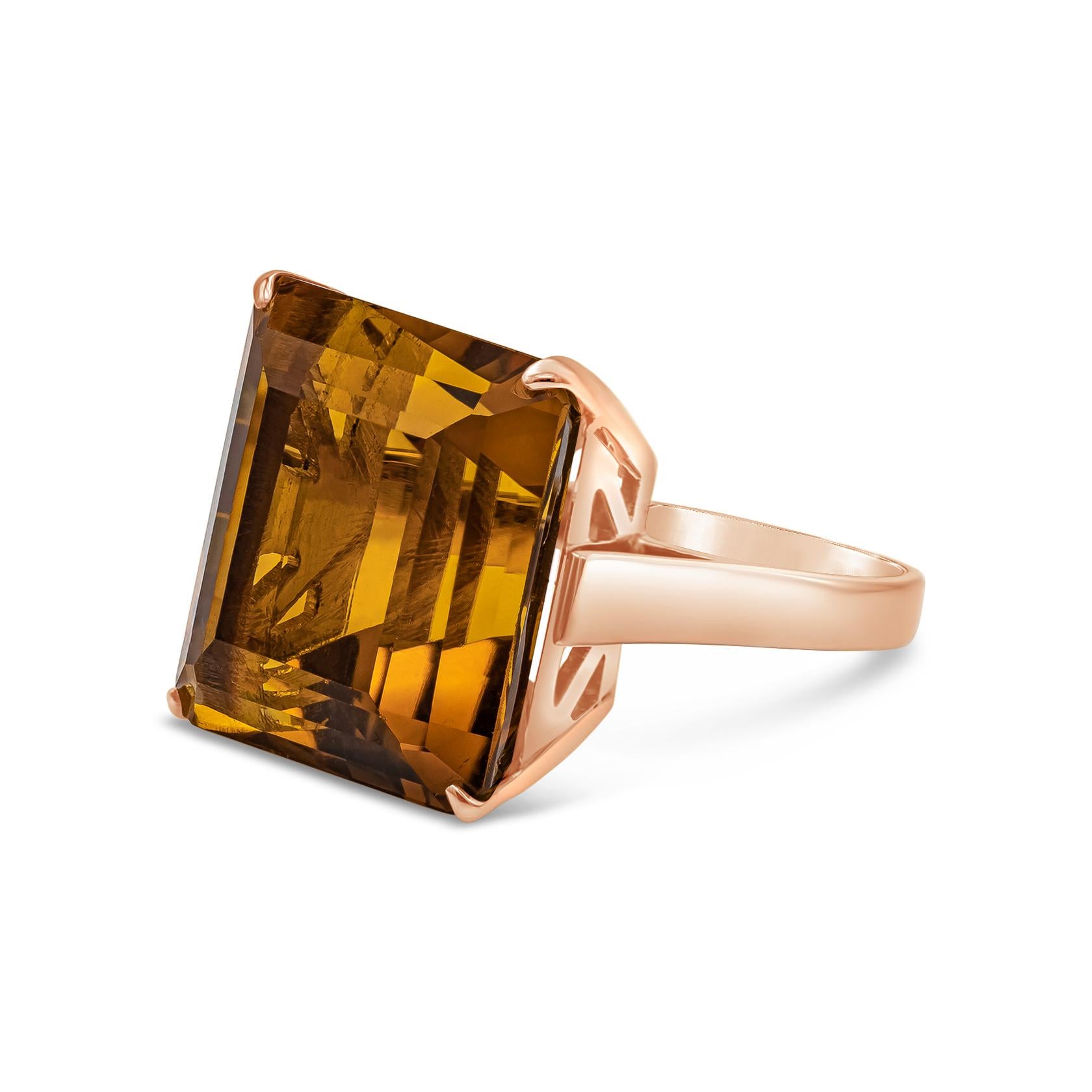 A color-rich cocktail ring showcasing a 24.20 emerald cut citrine set in a polished 14k rose gold. 

