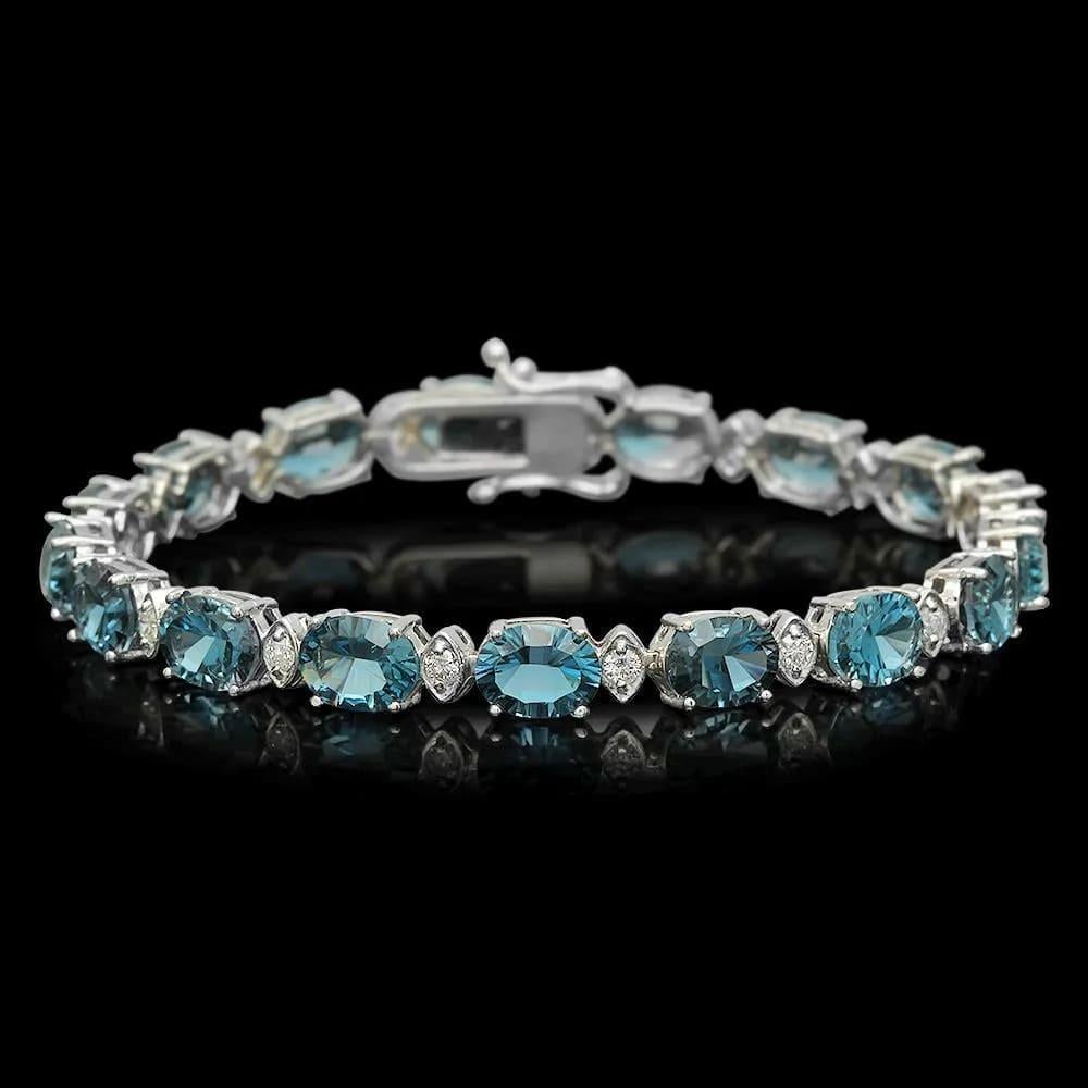 Taille mixte Bracelet en or blanc massif 14 carats avec topaze bleue naturelle 24,20 et diamants en vente