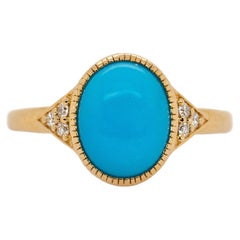 2.42.4cts 10x8mm Arizona Sleeping Beauty Turquoise w Diamond Accents in 14K Gold