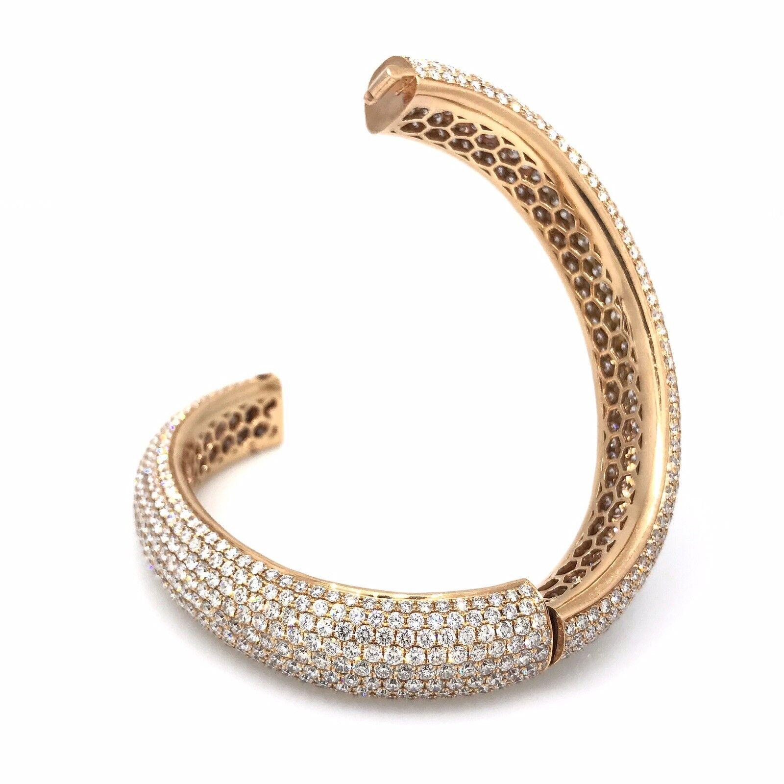 24.25 Carat Diamond Pave Bangle Bracelet in 18k Rose Gold

Fine Quality Oval Shaped Bangle Bracelet features 9 rows of Round Brilliant diamonds, pave set all around the bangle in 18k Rose Gold.
Diamond weight for the entire bracelet is estimated at