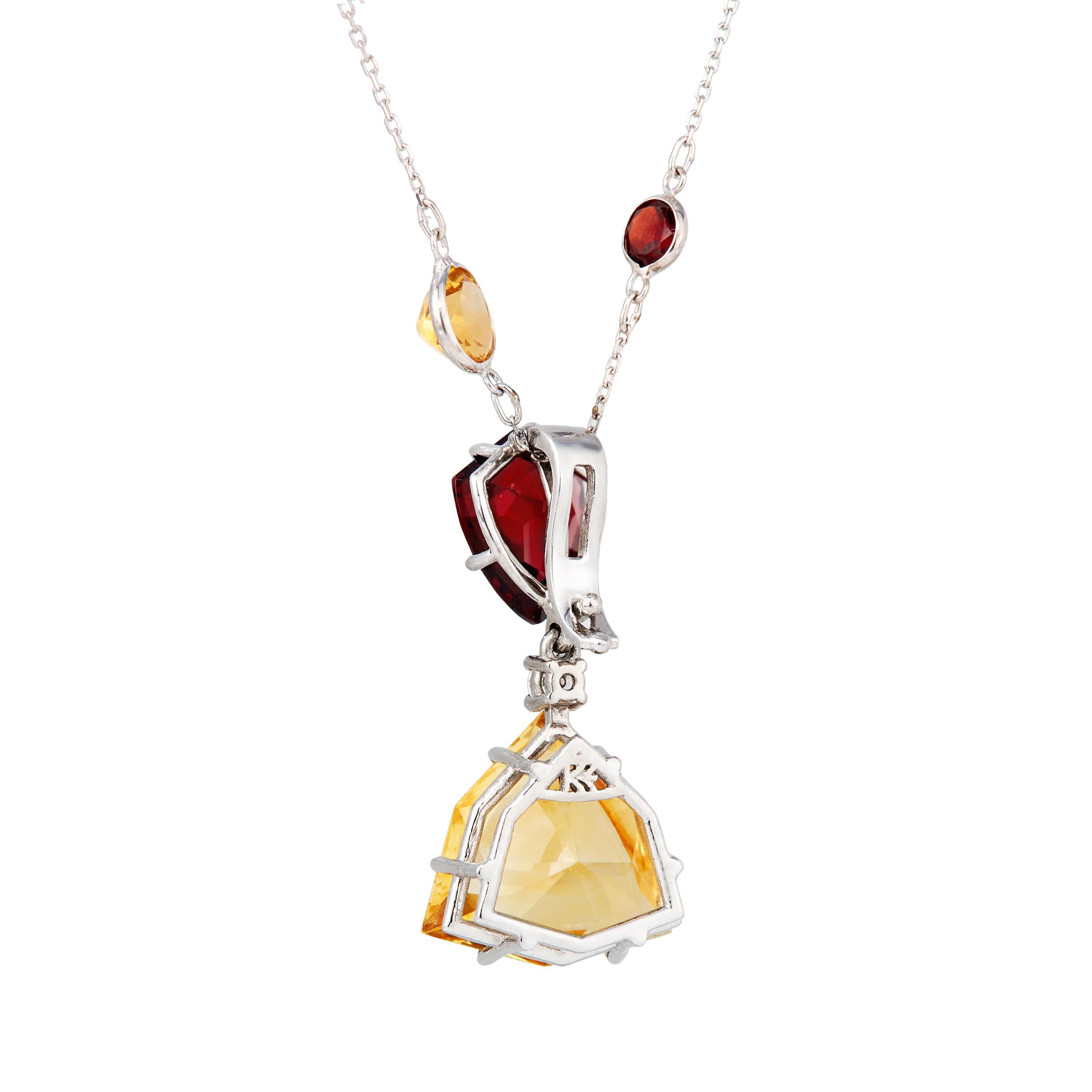 With 3 Modified Shield-shaped gemstones, this necklace has it's own kind of noble and powerful presence. The color combination of Garnet, Smokey Quartz, and this Honey-colored Citrine are sublime together. The 40