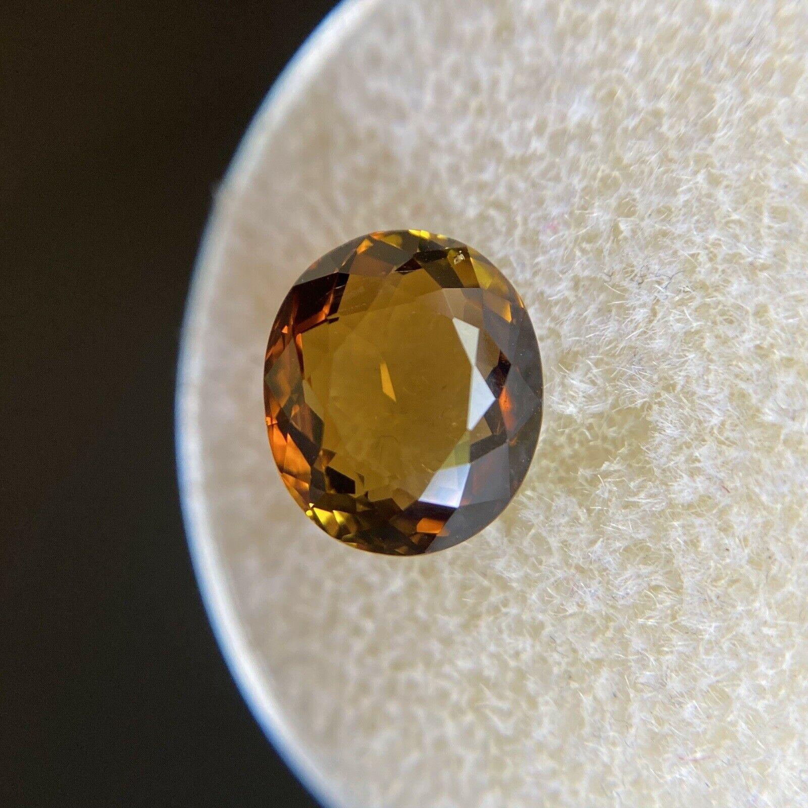 2.42ct Vivid Orange Yellow Tourmaline Oval Cut Loose Unique Rare Gem 9 x 8mm

Natural Yellow Orange Tourmaline Gemstone. 
2.42 Carat with a beautiful orange yellow colour and excellent clarity. Very clean stone with only some small natural