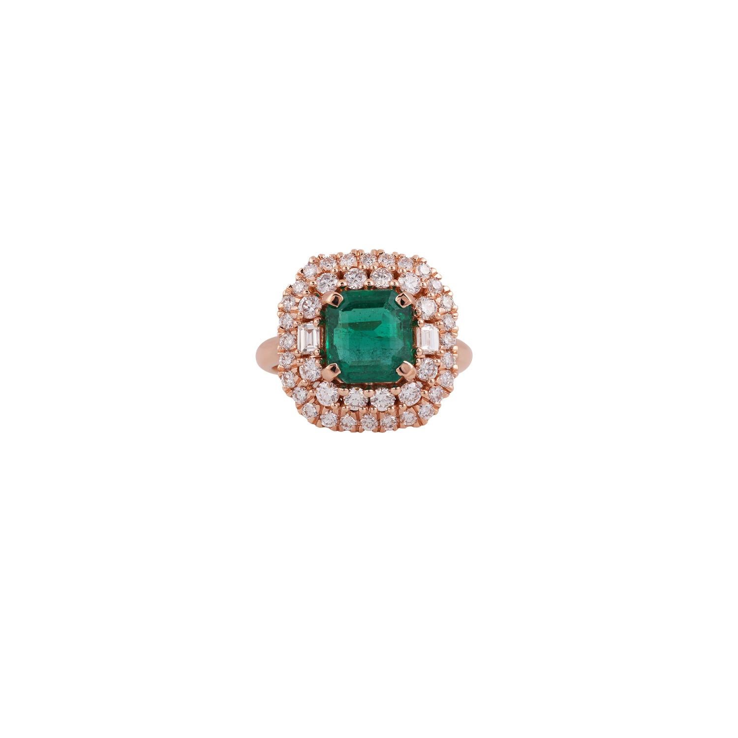 This is an elegant emerald & diamond ring studded in 18k Rose gold with 1 piece of  Zambian emerald weight 2.43 carat which is surrounded by 42 pieces of diamonds weight 1.10 carat, this entire ring studded in 18k Rose  gold.



 Ring size can be
