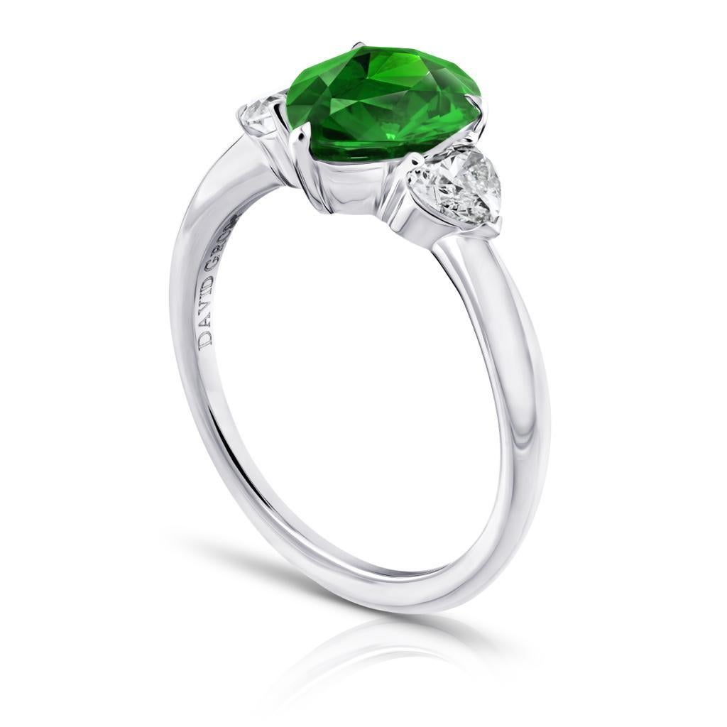 2.43 carat  Pear Green Tsavorite with two Heart Diamonds .60 carats set in a handmade Platinum ring
