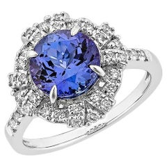 Bague en or blanc 18 carats avec tanzanite de 2,43 carats et diamant blanc.