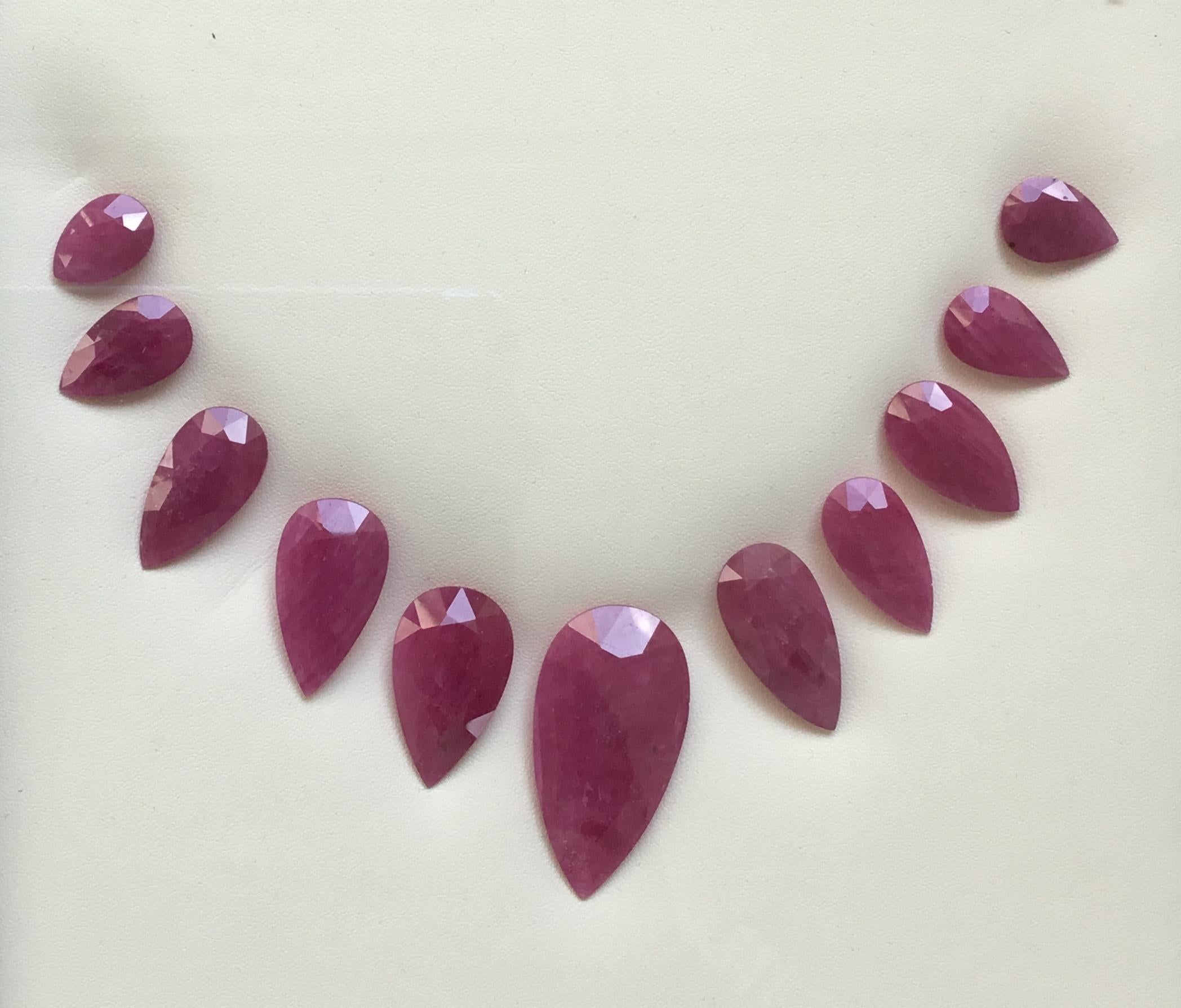 243.08 Carats Ruby Mozambique Pear Faceted Cut stone Layout Heated Natural Gem Unisexe en vente