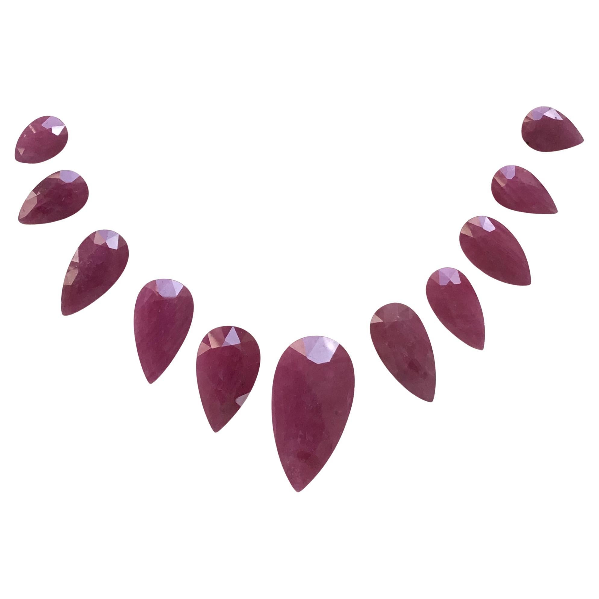 243.08 Carats Ruby Mozambique Pear Faceted Cut stone Layout Heated Natural Gem