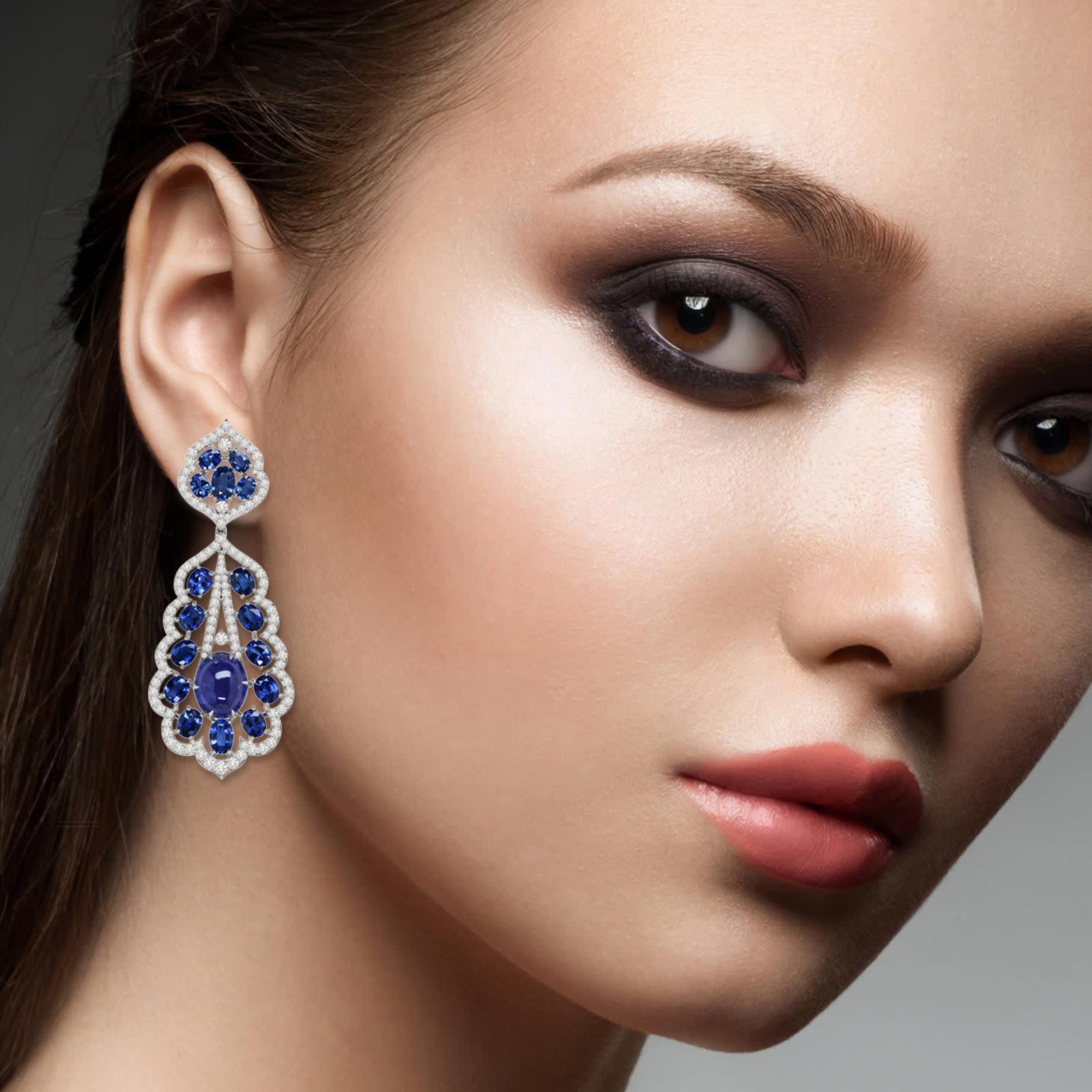 These beautiful drop earring are handcrafted in 14-karat gold. It is set with 24.36 carats tanzanite and 3.76 carats of sparkling diamonds.

FOLLOW  MEGHNA JEWELS storefront to view the latest collection & exclusive pieces.  Meghna Jewels is proudly