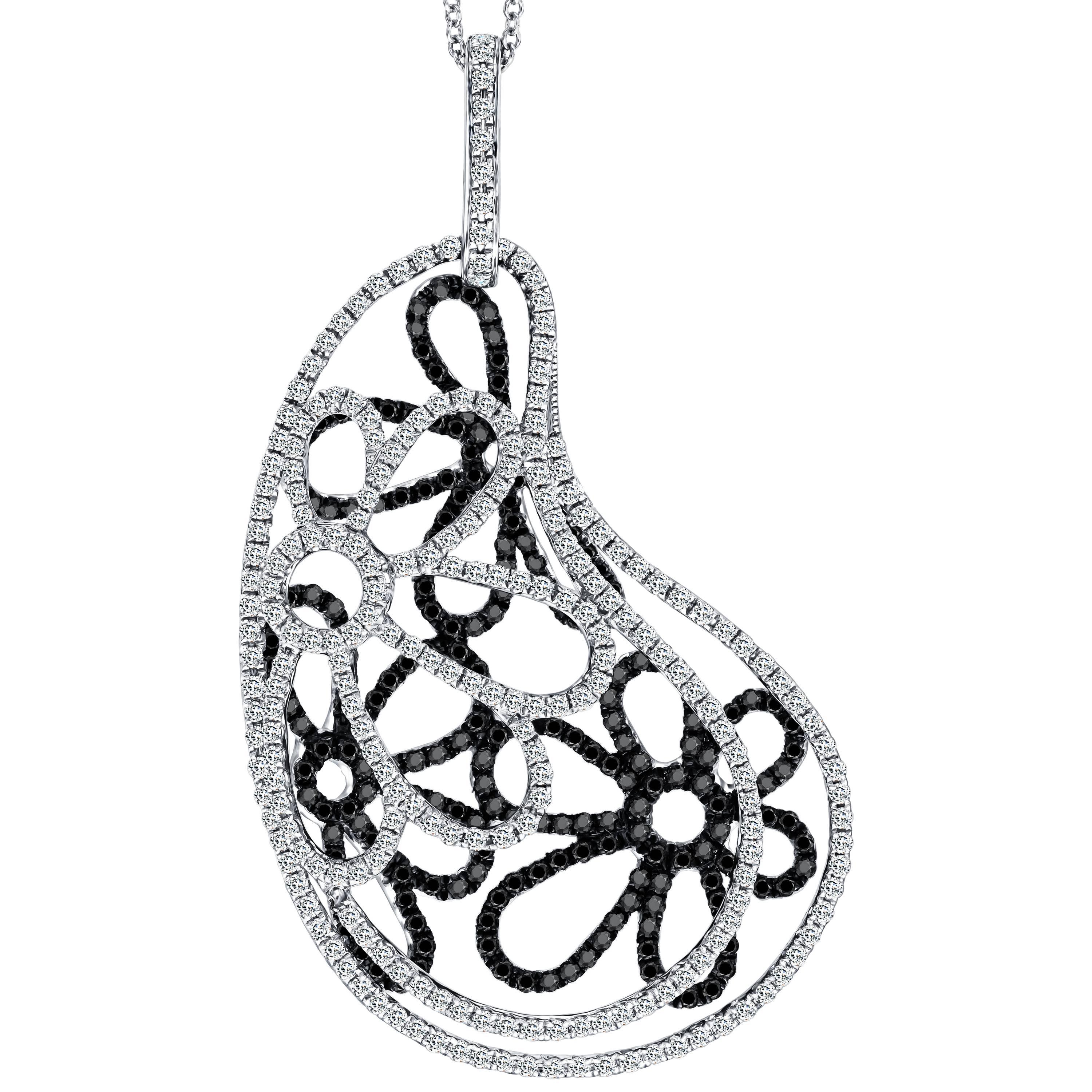 This bespoke fancy floral pendant is encrusted with a total of 2.44 Carat diamonds (1.13 Carat White Diamonds and 1.31 Carat Black Diamonds) high-quality white diamonds G - H colour and eye clean clarity SI. this exquisite and unique filigree