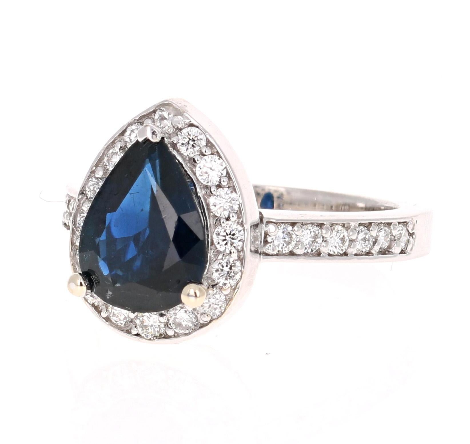 Gorgeous Engagement ring or Cocktail ring!   This beautiful setting has a 1.92 carat Pear Cut Sapphire in the center of the ring and is surrounded by 28 Round Cut Diamonds that weigh 0.58 carats.  The total carat weight of the ring is 2.44 carats. 
