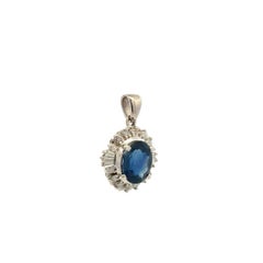 2.44 Carat Oval Sapphire and Baguette & RBC Diamond Platinum Vintage Pendant