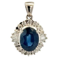 2.44 Carat Oval Sapphire and Baguette & RBC Diamond Platinum Vintage Pendant