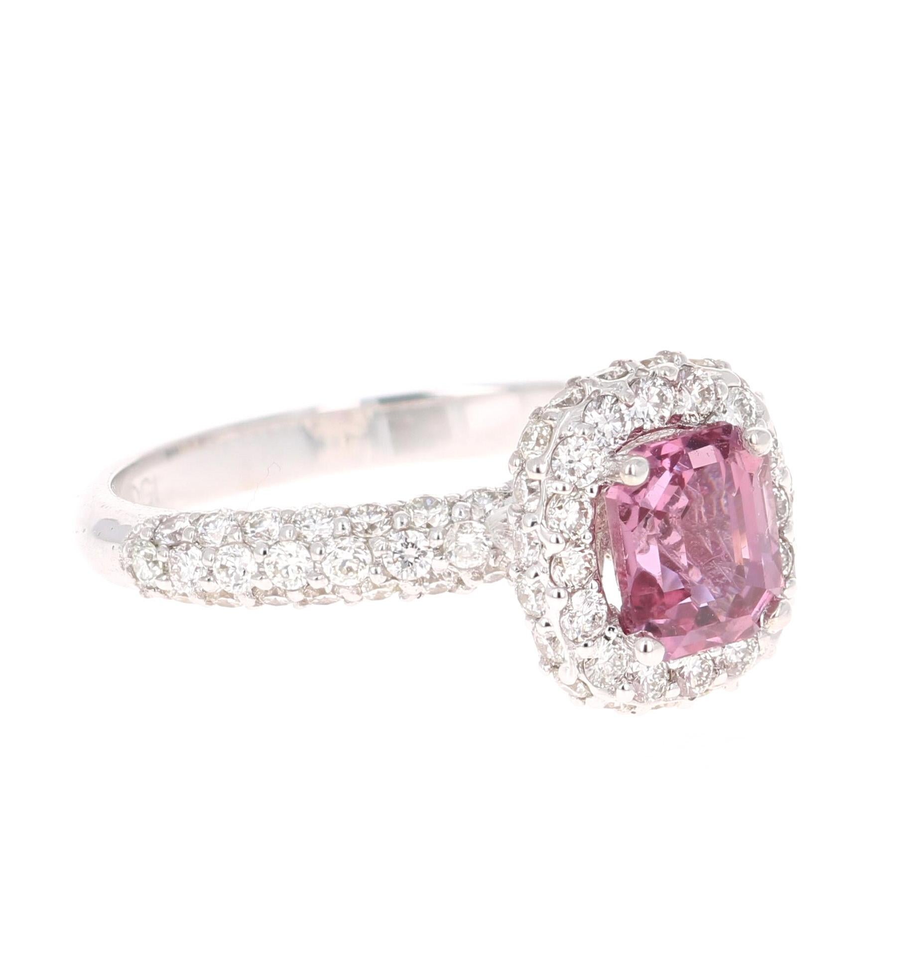 This beautiful ring has a Natural Emerald Cut Pink Sapphire that weights 1.47 Carats. The Pink Sapphire has been certified by GIA, Certificate #: 2191204352

The ring is embellished with Round Cut Diamonds that weigh 0.97 Carats with a clarity and