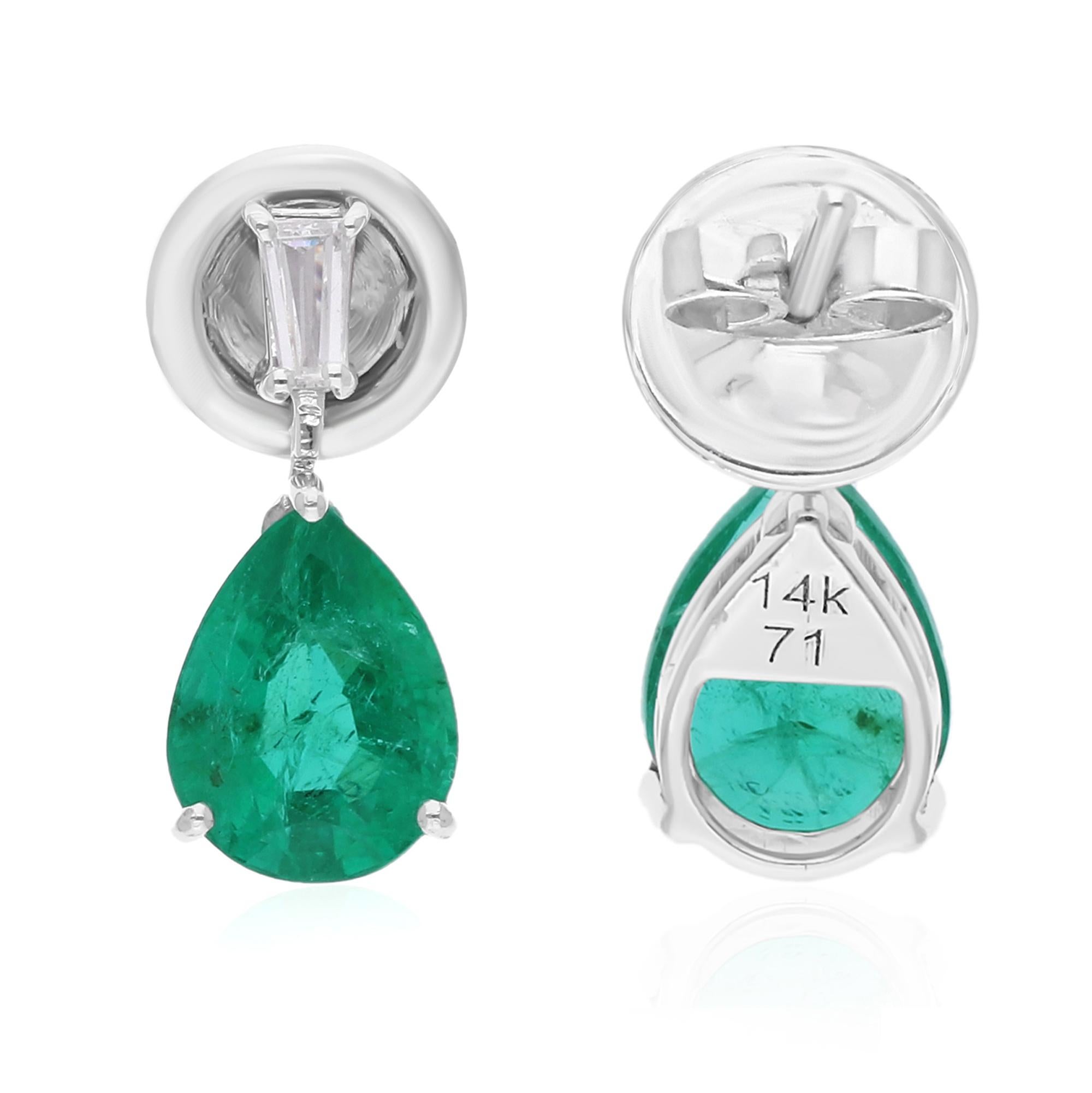 Cast from 14-karat gold, these exquisite earrings are handset with 2.44 carat Zambian Emerald and 0.12 carats of sparkling diamonds.

FOLLOW SPECTRUM JEWELS storefront to view the latest collection & exclusive pieces. Spectrum Jewels is proudly