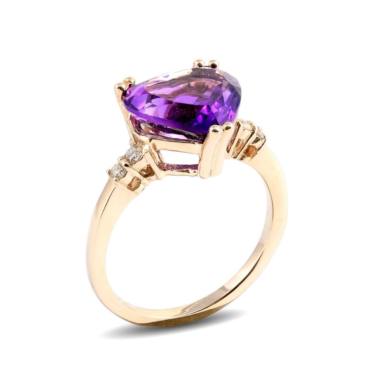 A color that has a glorious avatar, here is a 2.44 carat Amethyst that comes set with diamonds on either side adding a little sparkle. Allowing light to create the spectacle intended, this beautiful gemstone has unmatched brilliance. With royal