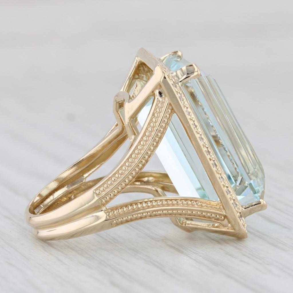 Información sobre la gema:
- Aguamarina natural -
Quilates - 24,25ct 
Talla - Esmeralda
Color - Aqua
Tratamiento - Calentado

- Diamantes naturales -
Quilates totales - 0,20ctw
Talla - Redonda brillante
Color - H - J
Claridad - SI1 - SI2

Metal: Oro