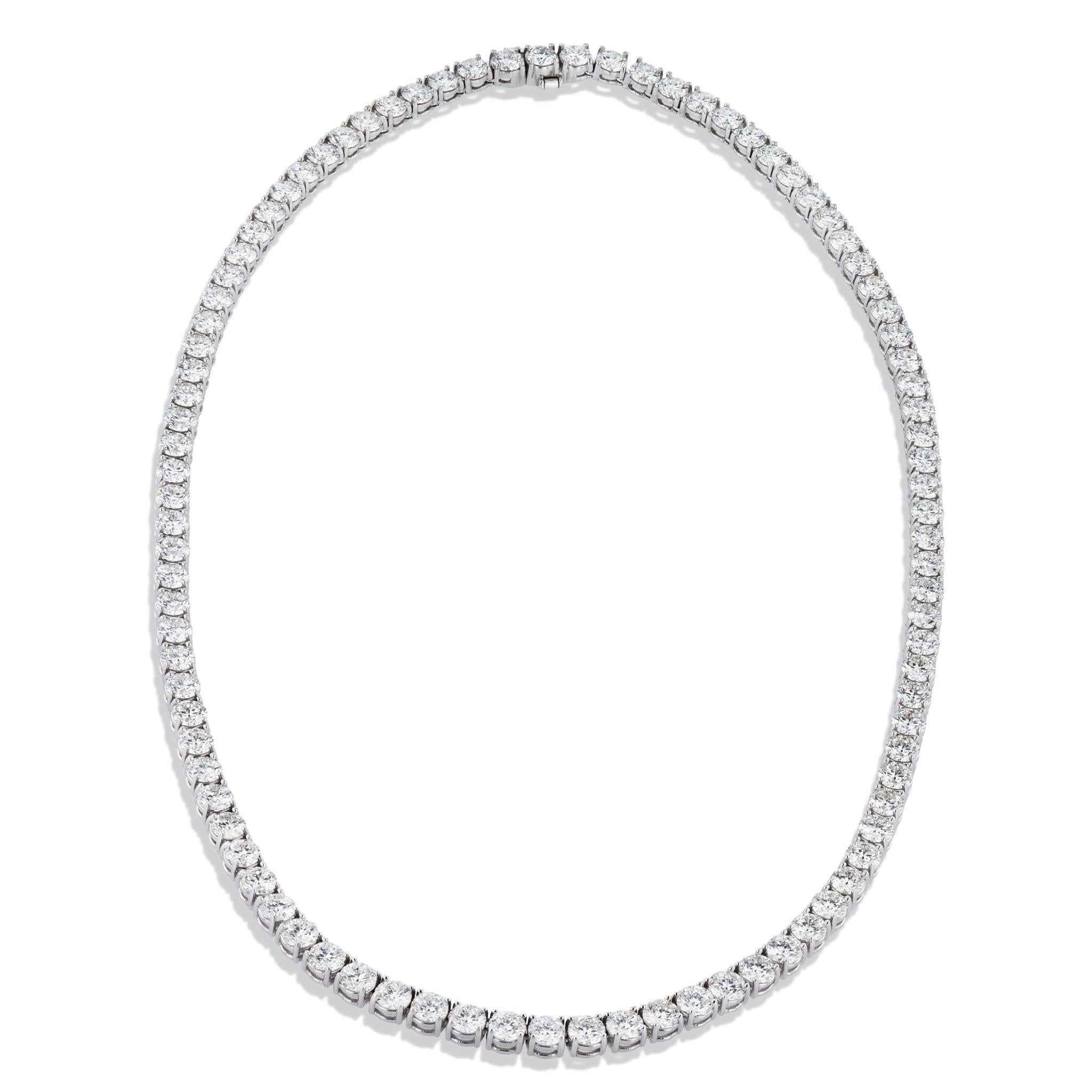 Elevate your wardrobe with an exquisite 24.47 carat Diamond White Gold Tennis Necklace! This one-of-a-kind statement necklace features 18kt. White Gold prongs set with dazzling diamonds. A gleaming 16