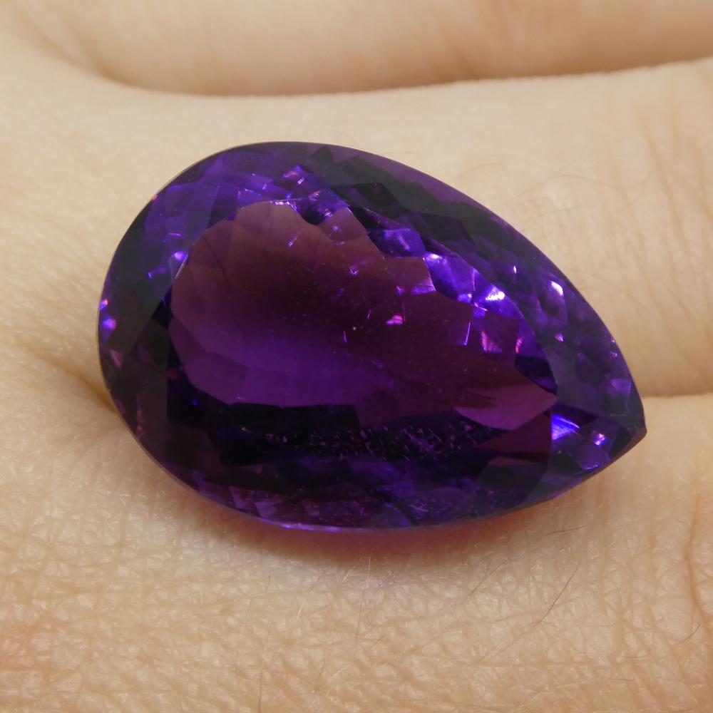 Description:

Gem Type: Amethyst
Number of Stones: 1
Weight: 24.49 cts
Measurements: 21.50x14.70x12.4 mm
Shape: Pear
Cutting Style Crown: Modified Brilliant
Cutting Style Pavilion: Modified Brilliant
Transparency: Transparent
Clarity: Very Slightly