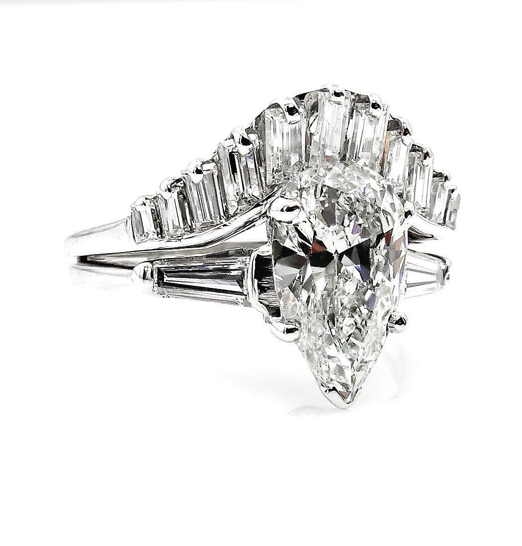 A Stunning Mid-Century Estate Vintage Pear Shaped Diamond Ring from our Estate Collection - is actually comprised of a two-piece wedding set... Original vintage wedding sets are hard to find and this bright and splashy white gold and diamond set