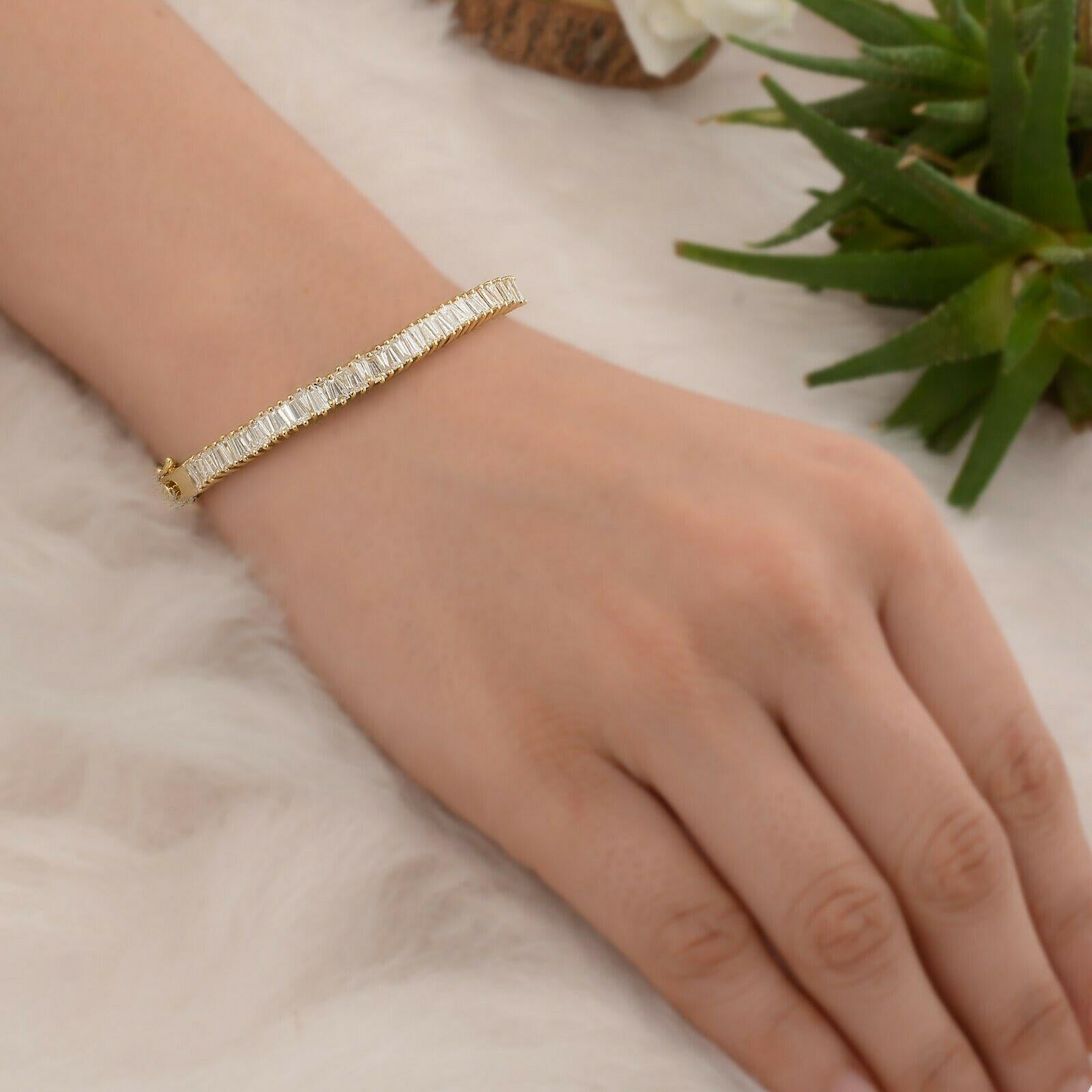 A stunning bracelet handmade in 14K gold. It is set in 2.45 carats of baguette diamonds. Wear it alone or stack it with your favorite pieces.

FOLLOW MEGHNA JEWELS storefront to view the latest collection & exclusive pieces. Meghna Jewels is proudly