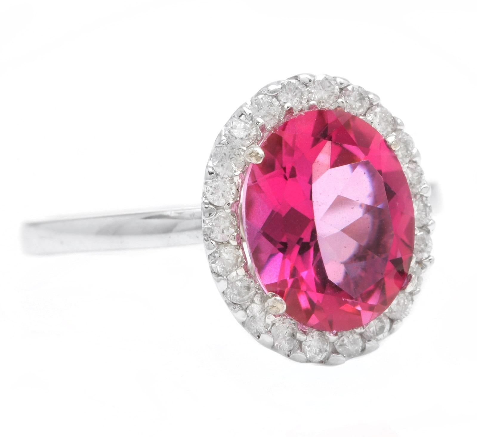 2.45 Carats Natural Very Nice Looking Pink Topaz and Diamond 14K Solid White Gold Ring

Total Natural Oval Cut Pink Topaz Weight is: Approx. 2.20 Carats

Topaz Measures: Approx. 10.00 x 8.00mm

Natural Round Diamonds Weight: Approx. 0.25 Carats