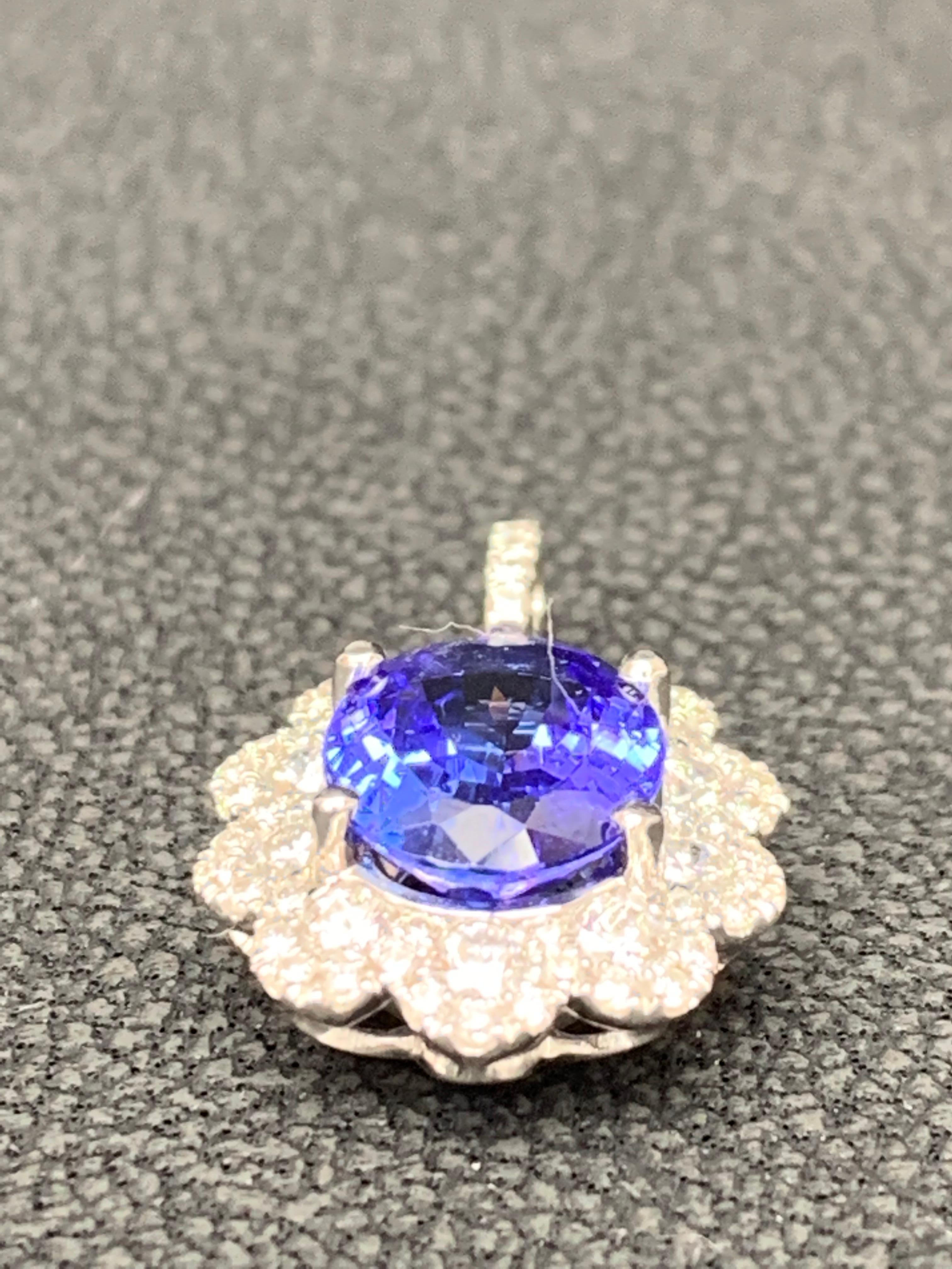 2.45 Carat Oval Cut Tanzanite and Diamond Halo Flower Pendant Necklace For Sale 6