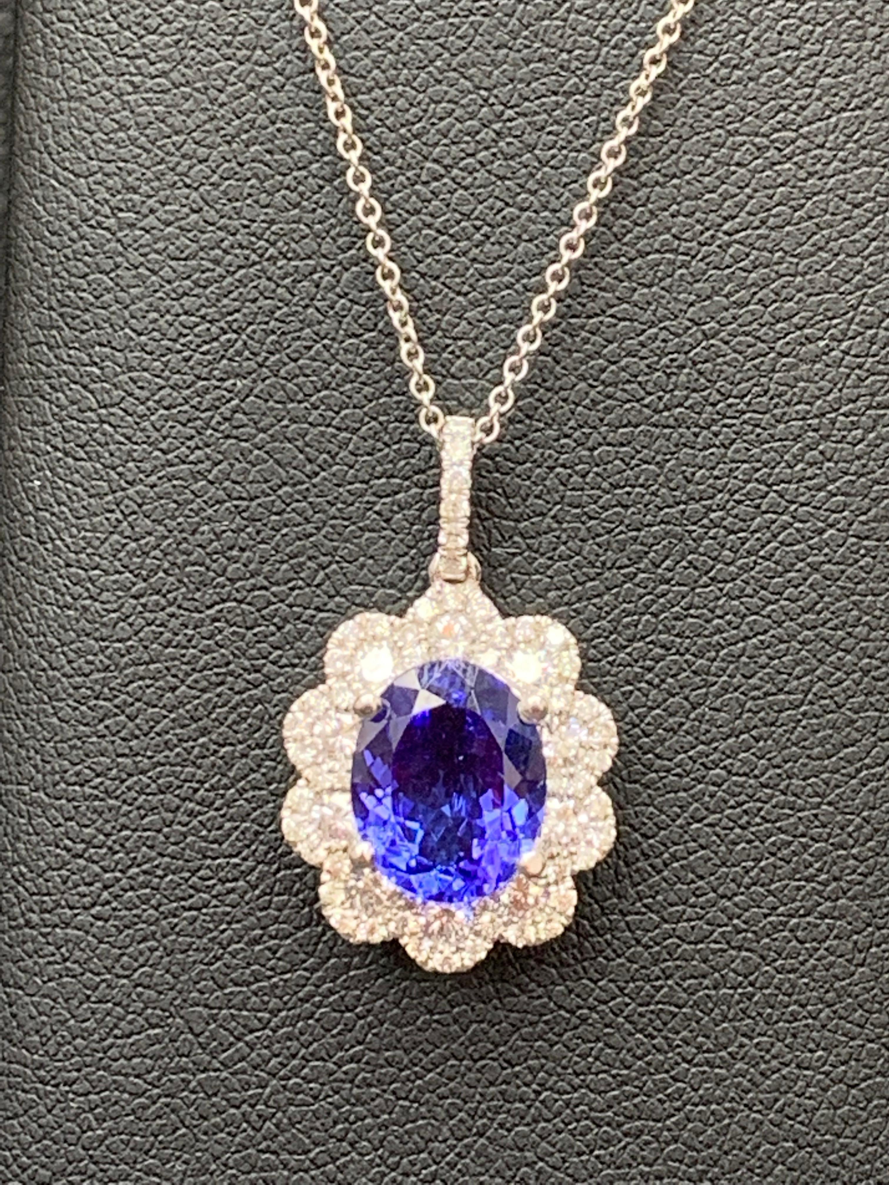 2.45 Carat Oval Cut Tanzanite and Diamond Halo Flower Pendant Necklace In New Condition For Sale In NEW YORK, NY