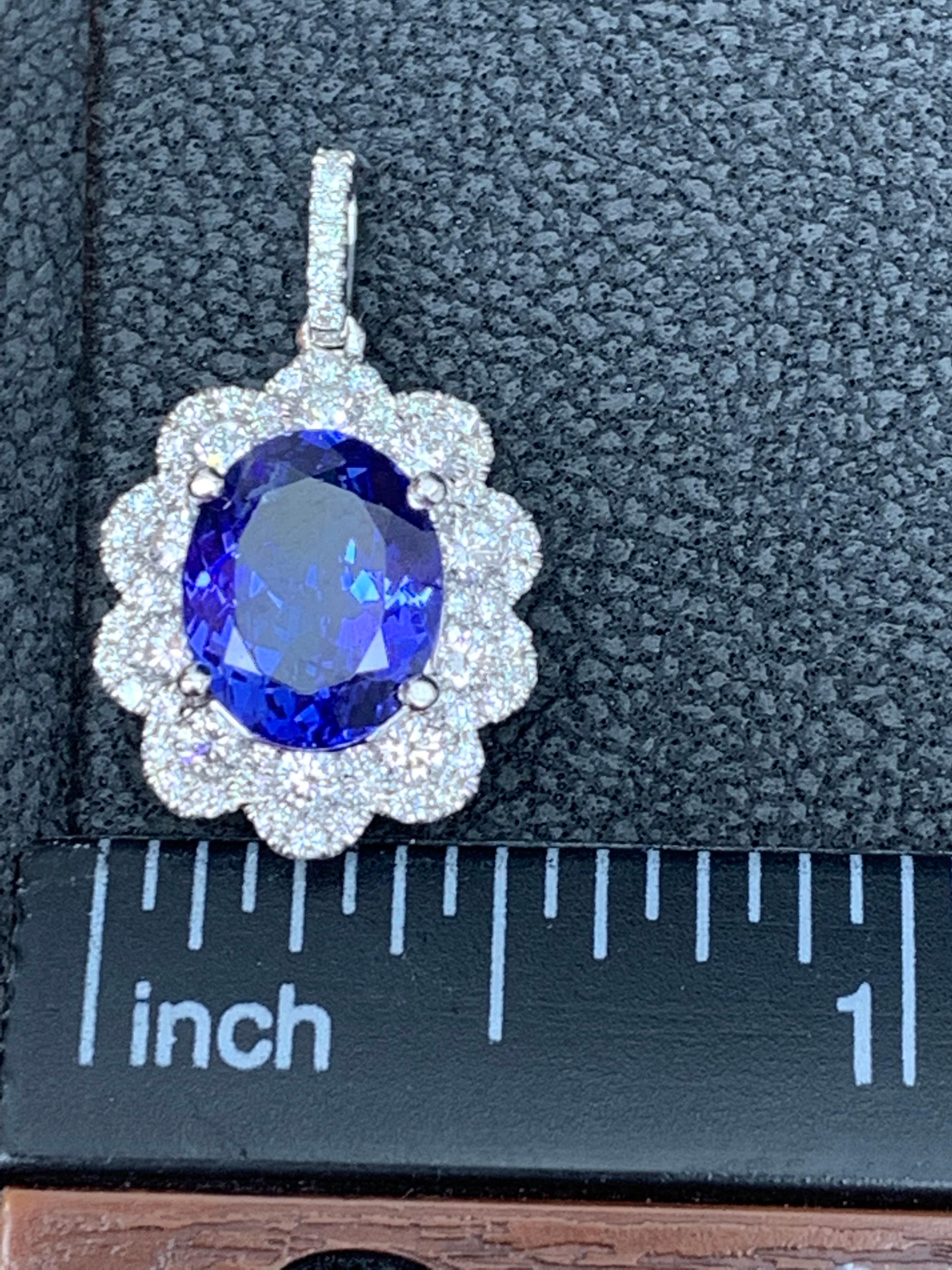 2.45 Carat Oval Cut Tanzanite and Diamond Halo Flower Pendant Necklace For Sale 4