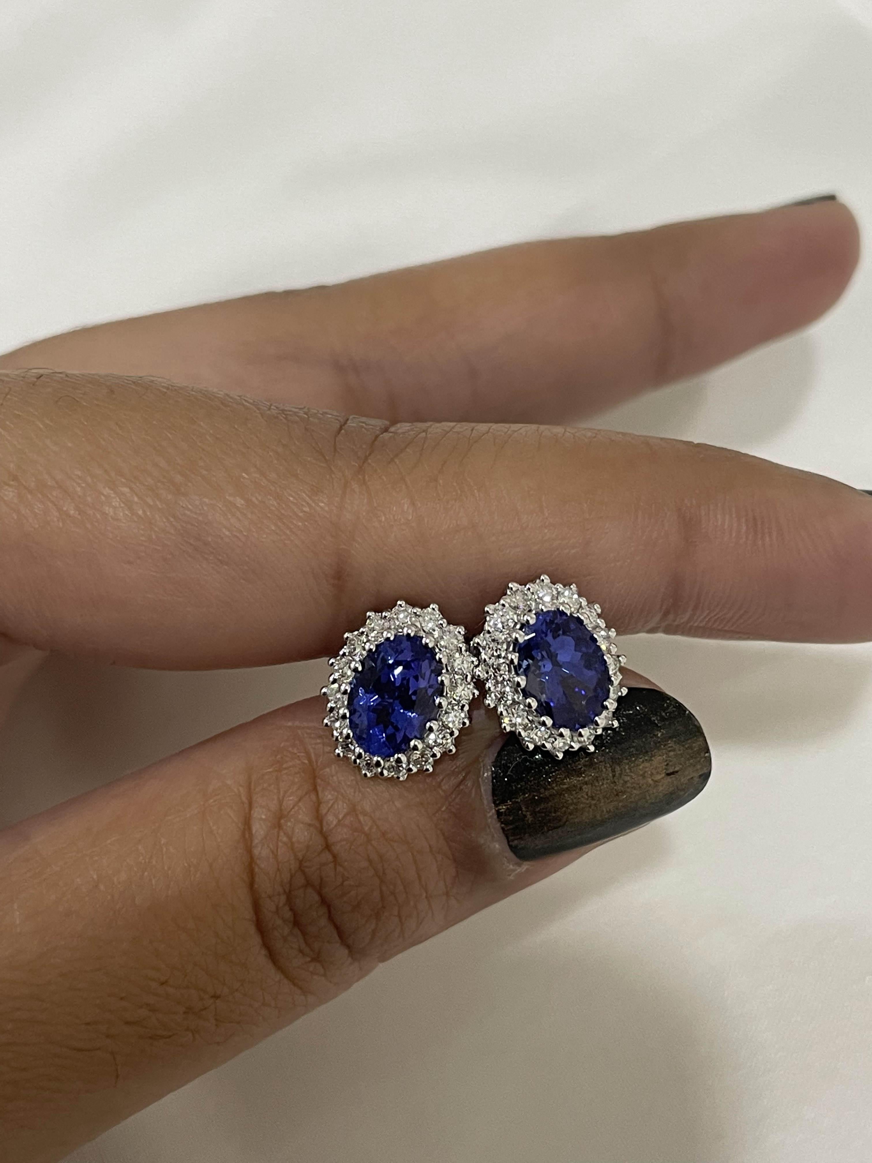 2.45 Carat Oval Shaped Tanzanite Stud Earrings in 18K White Gold with Diamonds In New Condition For Sale In Houston, TX