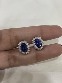 2.45 Carat Oval Shaped Tanzanite Stud Earrings in 18K White Gold with Diamonds