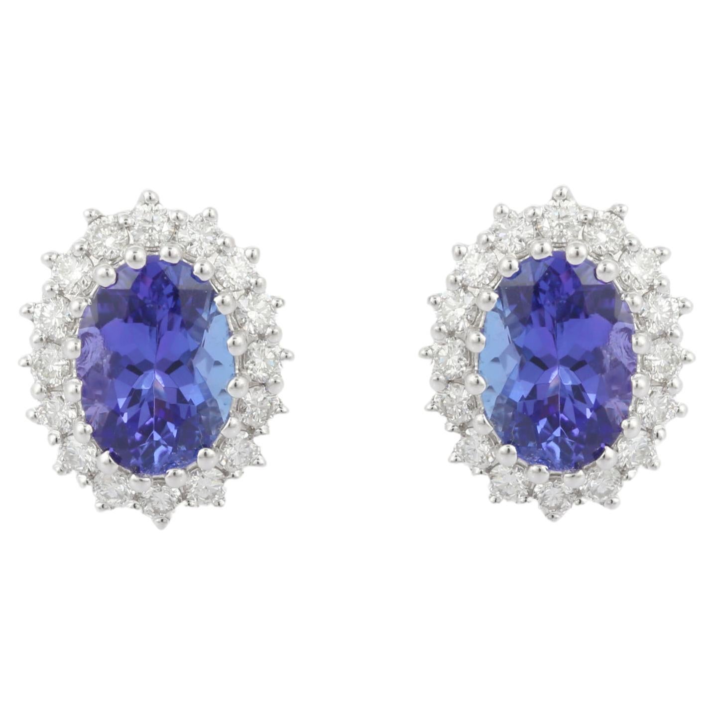 2.45 Carat Oval Shaped Tanzanite Stud Earrings in 18K White Gold with Diamonds For Sale