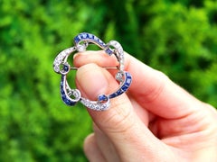 2.45 Carat Sapphire and 1.75 Carat Diamond Platinum Brooch