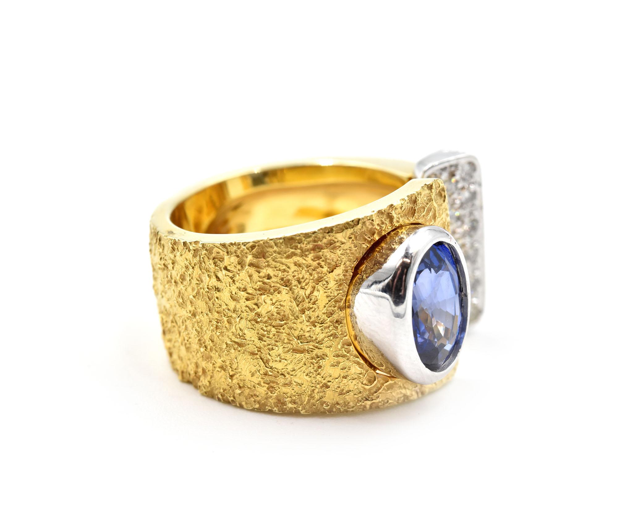 Designer: custom design
Material: 14k white and yellow gold
Sapphire: oval 2.45 carat weight
Diamonds: 17 round cut = 0.26 carat weight
Color: H
Clarity: SI1
Ring Size: 7 (please allow two additional shipping days for sizing requests) 
Dimensions: