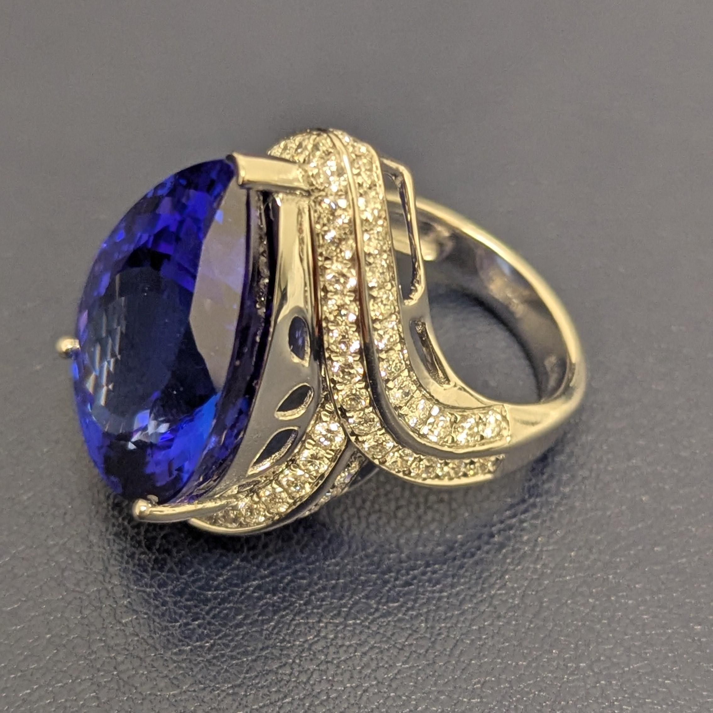 Pear Cut 24.5 Carat Tanzanite Diamond 18K White Gold Ring For Sale