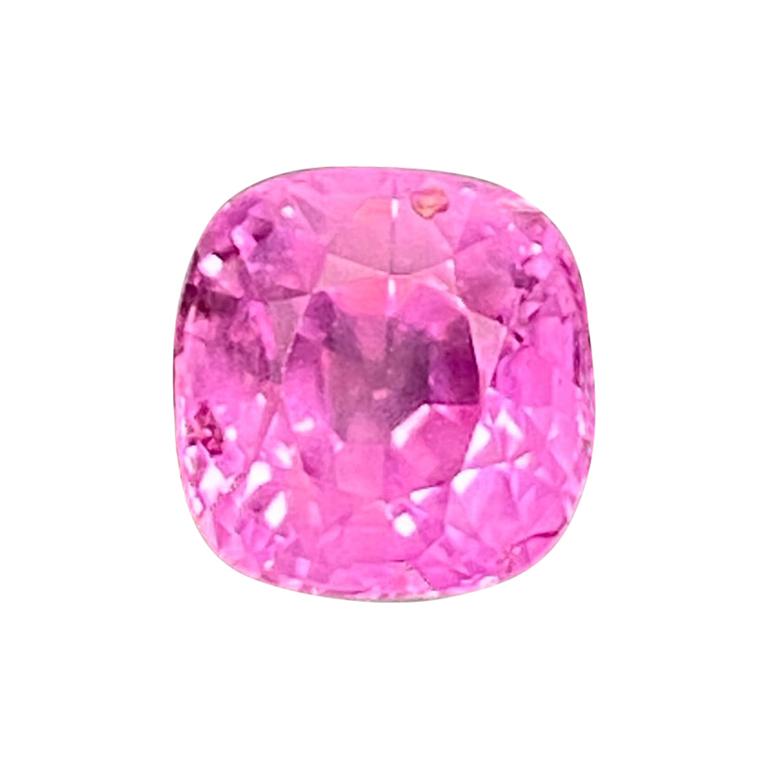 2.45 Carat GUILD Certified Unheated Cushion-Cut Burmese Purplish-Pink Sapphire:

A beautiful gem, it is a 2.45 carat unheated cushion-cut Burmese pink sapphire. Hailing from the historic Mogok mines in Burma as certified by GUILD Lab, the sapphire