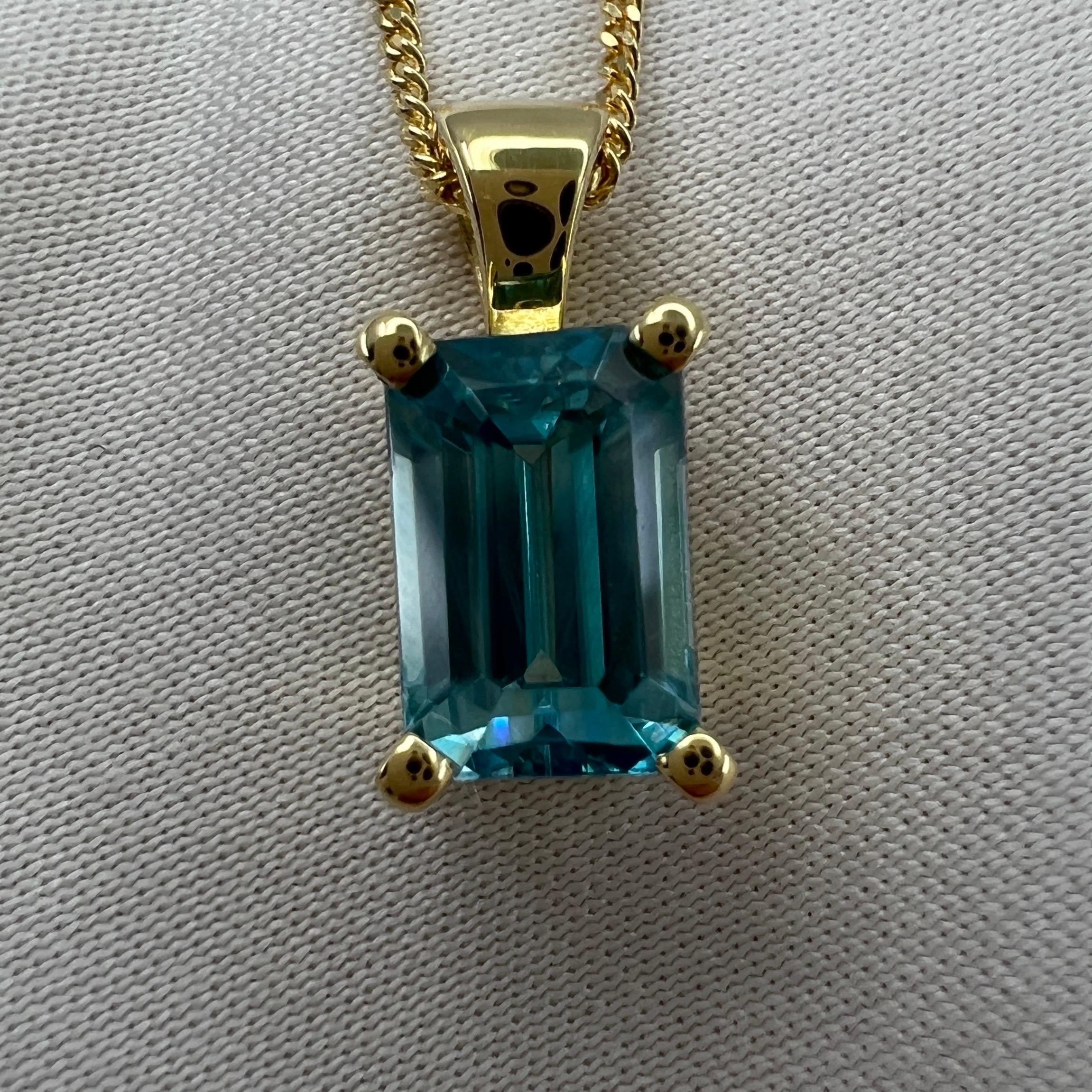 2.45 Carat Vivid Neon Blue Zircon Emerald Cut 18k Yellow Gold Pendant Necklace For Sale 2
