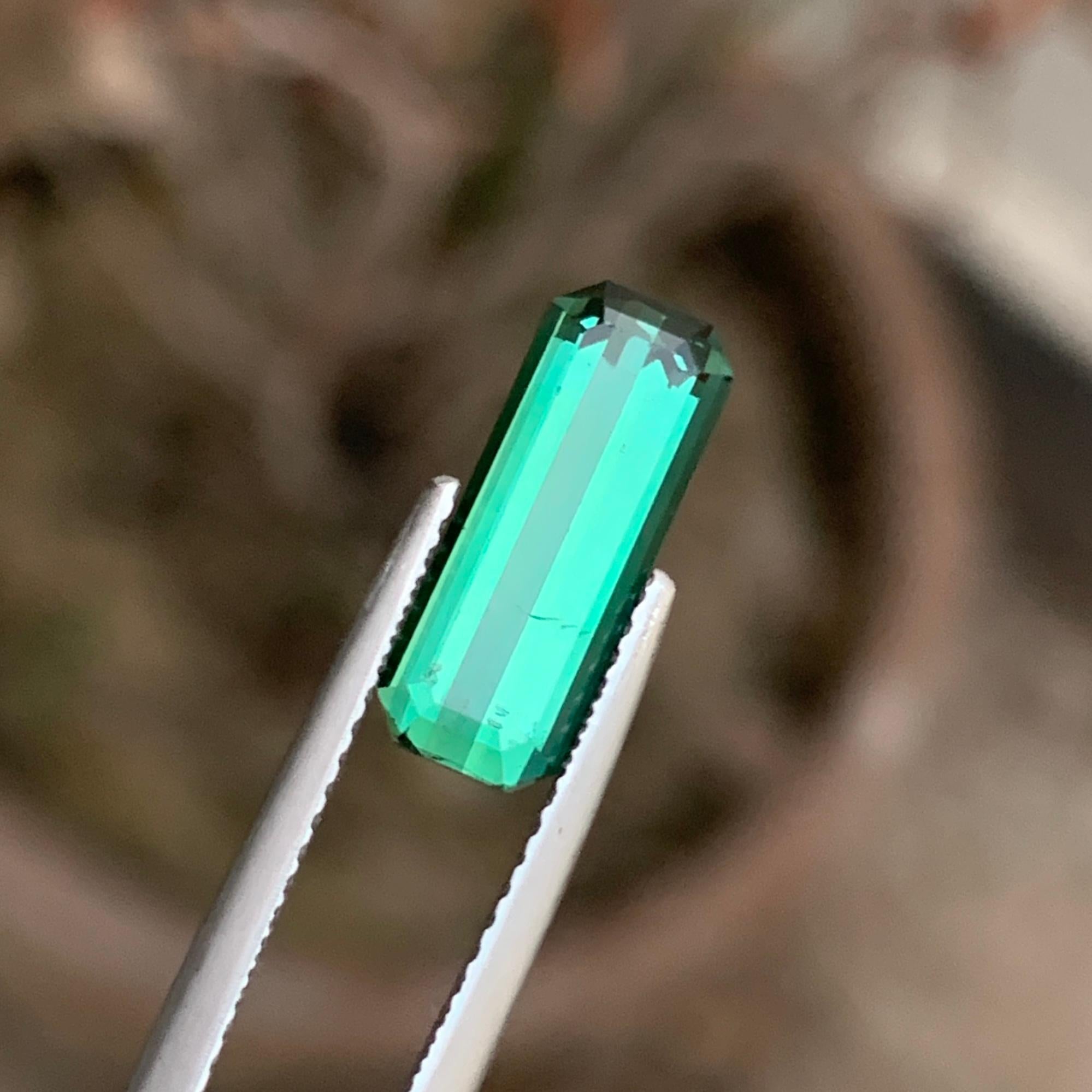 Loose Tourmaline 
Weight: 2.45 Carats 
Dimension: 13.2x5.1x3.9 Mm
Origin; Kunar Afghanistan
Shape: Emerald 
Color: Lagoon Green
Treatment: Non
Certificate: On Demand 
Tourmaline is a fascinating gemstone with a rich history and a wide range of