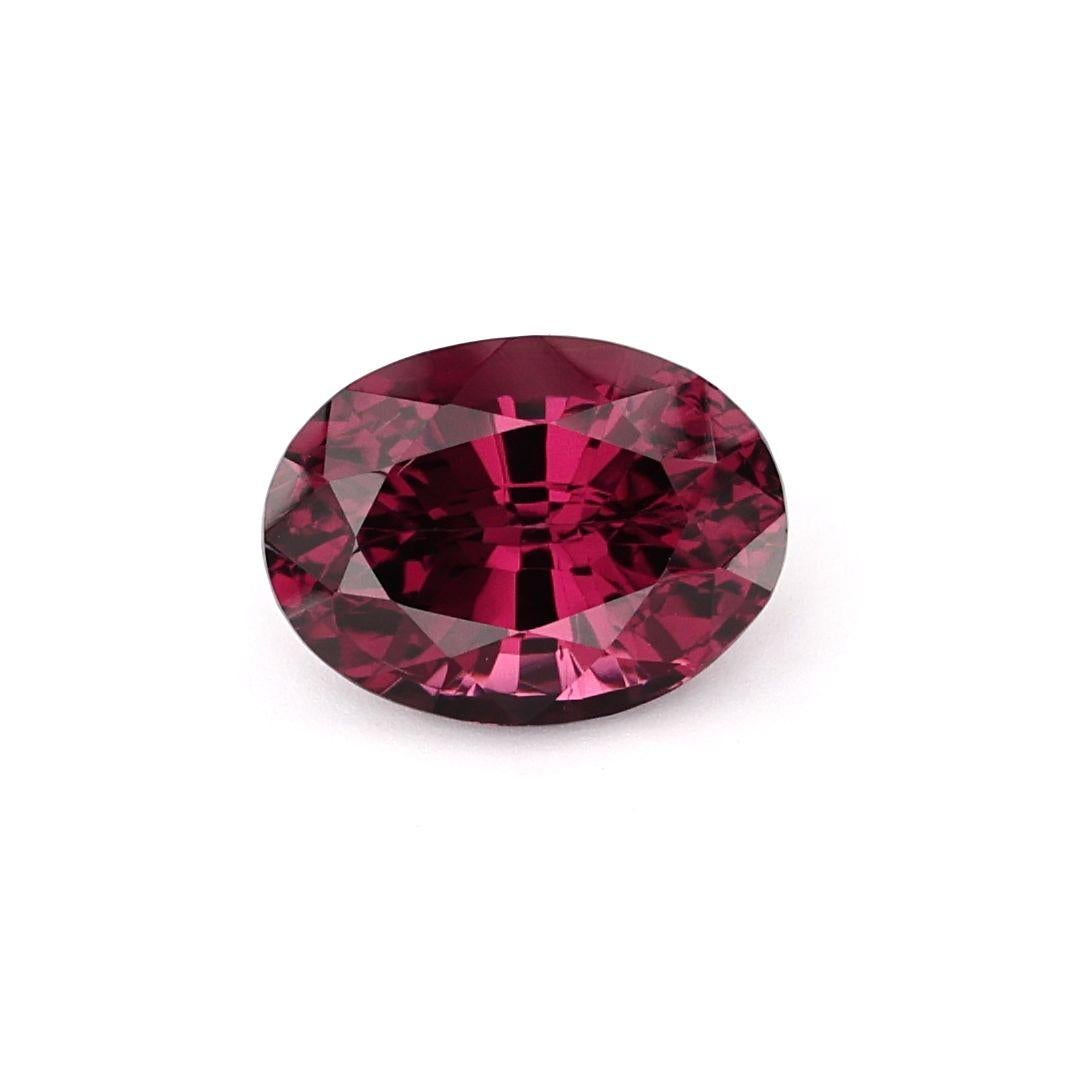 A Natural garnet with a dominant hue of pinkish red. Cut into an Oveal shape, this stone weighs almost 2.45 carats.

The Garnet inspires romantic love, passion, sensuality, intimacy, positive thoughts, inspiration, energy, past life recall, career