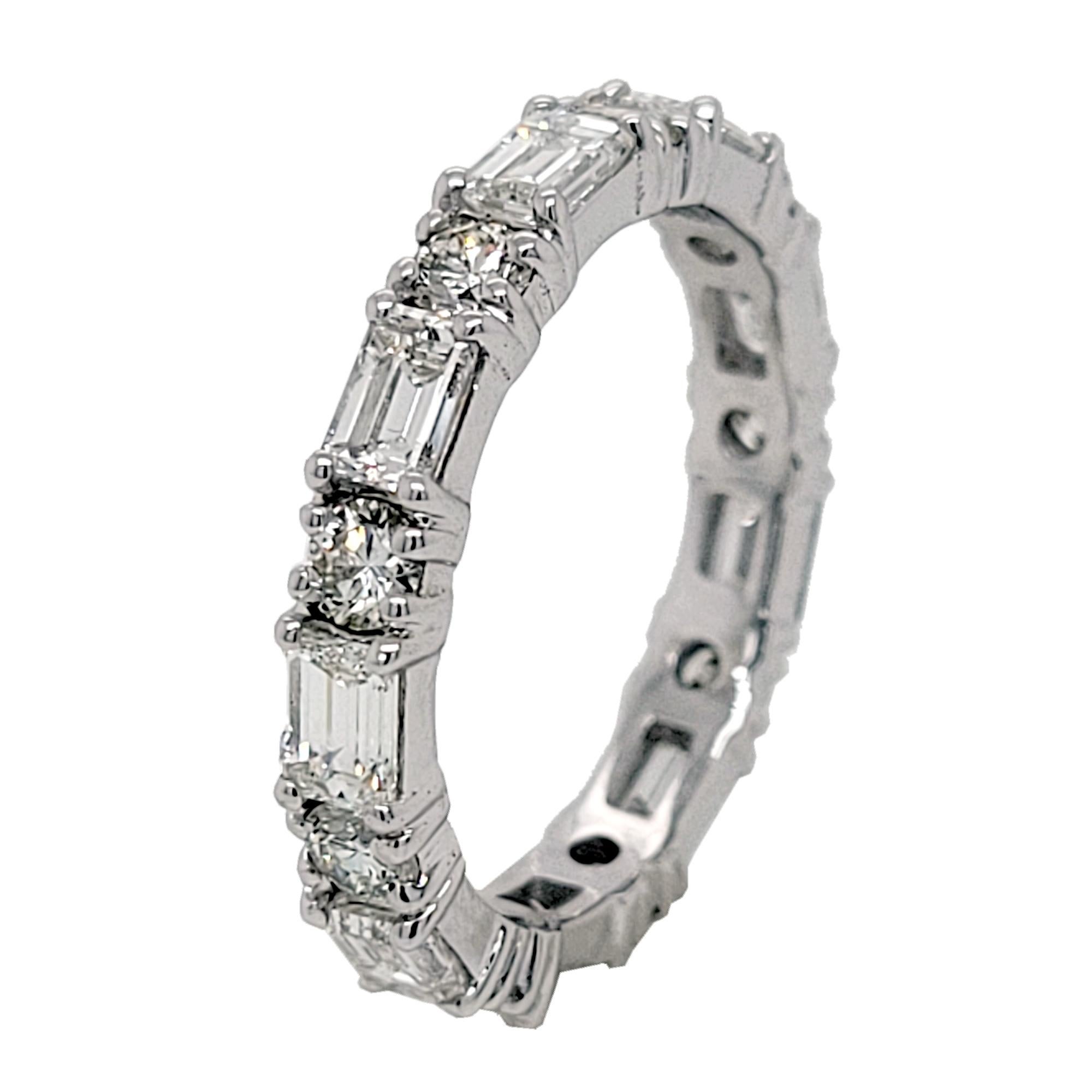 This beautiful Eternity Ring is made in 18K White Gold showcasing 9 perfectly matched VS/E-F Emerald Cut and 9 Round Brilliant Diamonds Set in Shared Prong Mode.
Total Weight of diamonds: 2.45 Ct Clarity: VS, Color: E-F
Total Weight of the Ring: 3.3